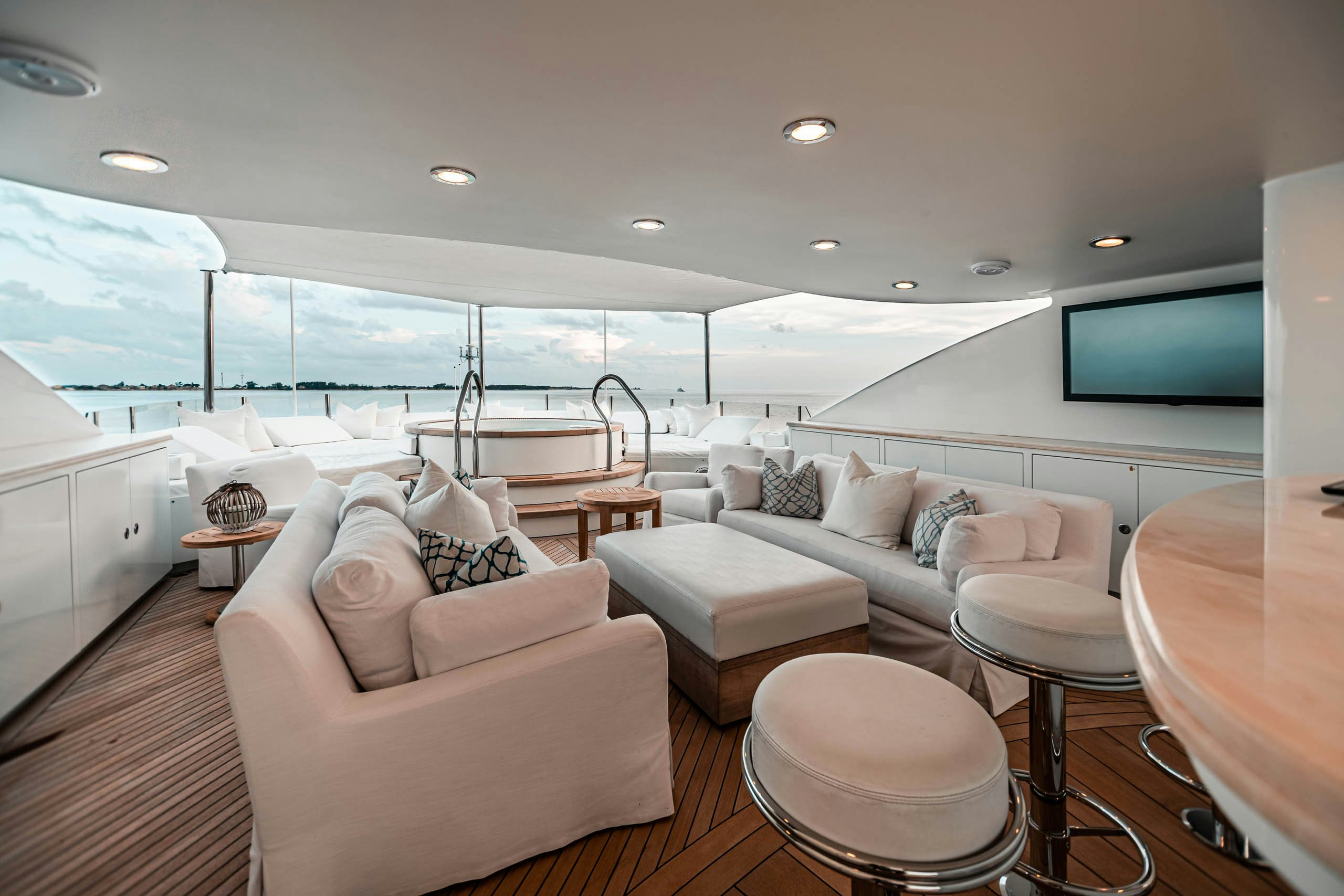 a living room with a large window aboard MIRABELLA Yacht for Charter