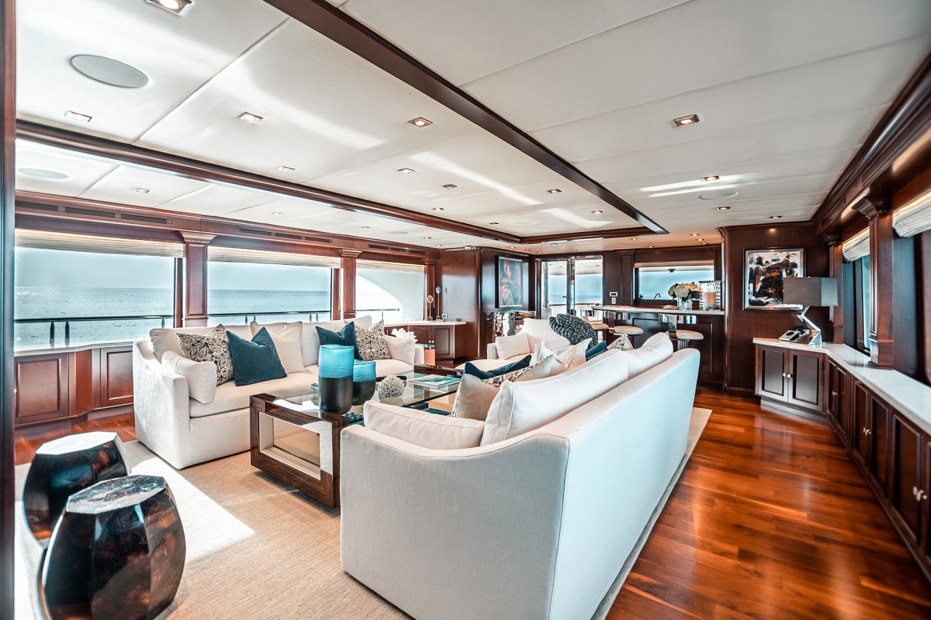 a living room with a large window aboard MIRABELLA Yacht for Sale