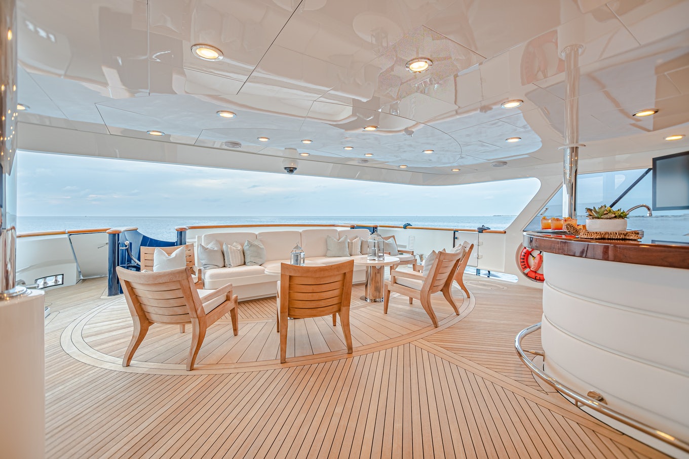a room with a table and chairs aboard MIRABELLA Yacht for Sale