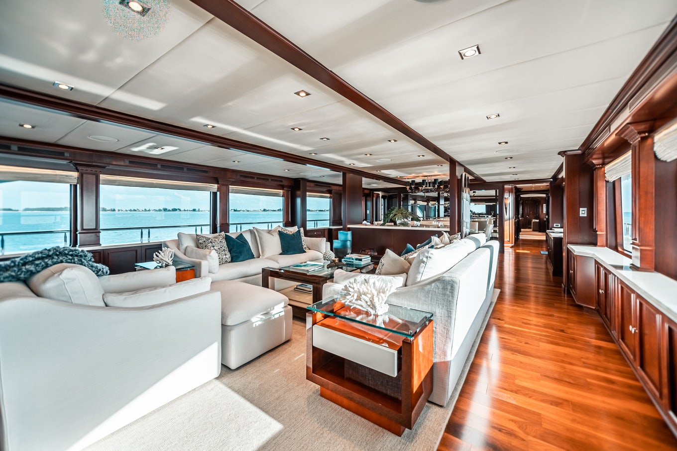 a living room with a large window aboard MIRABELLA Yacht for Sale