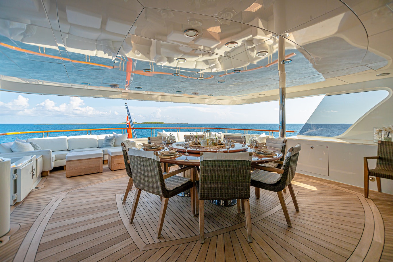 a table set for a meal on a cruise ship aboard MIRABELLA Yacht for Sale