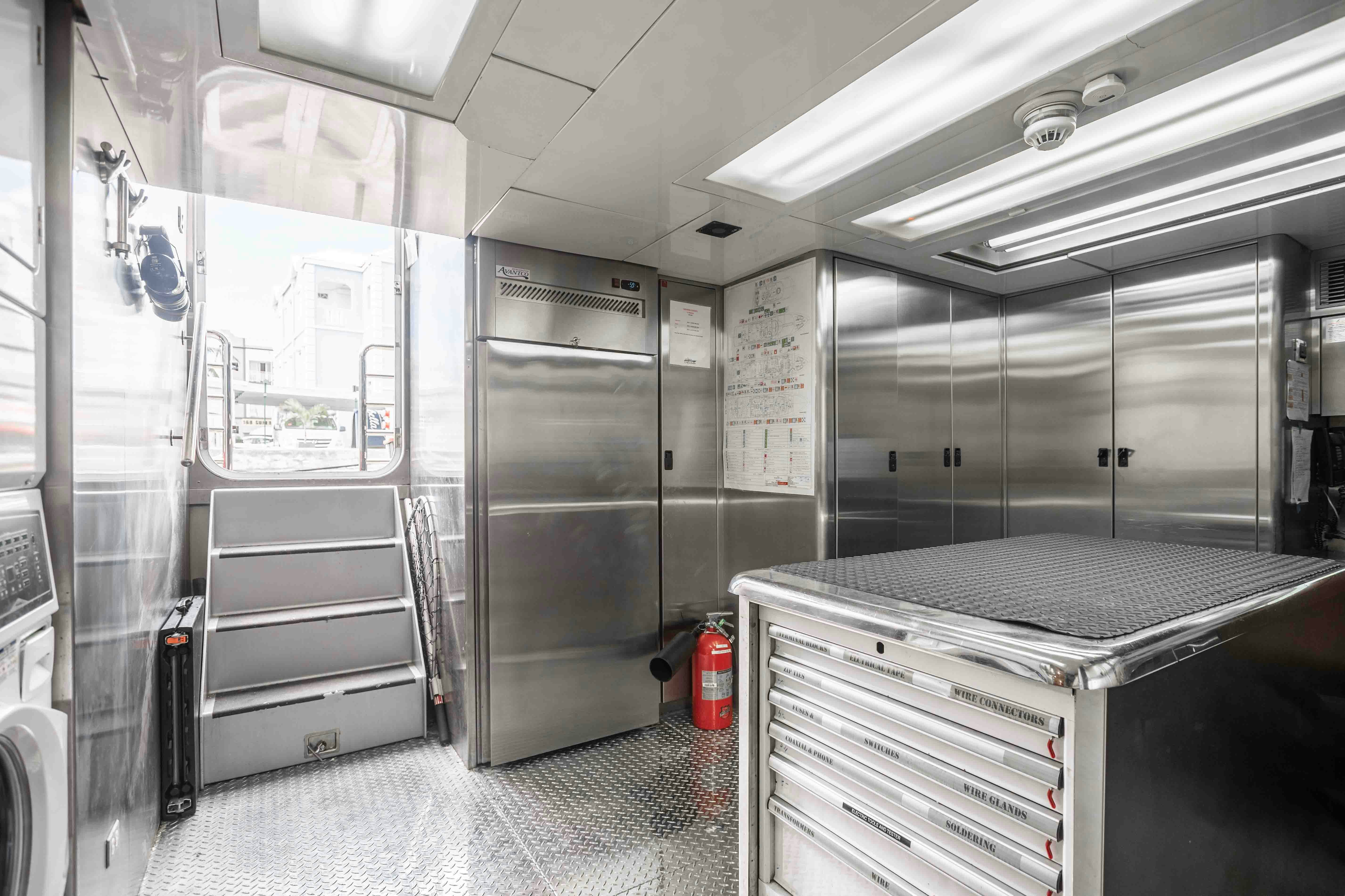 a room with a large refrigerator aboard MIRABELLA Yacht for Sale