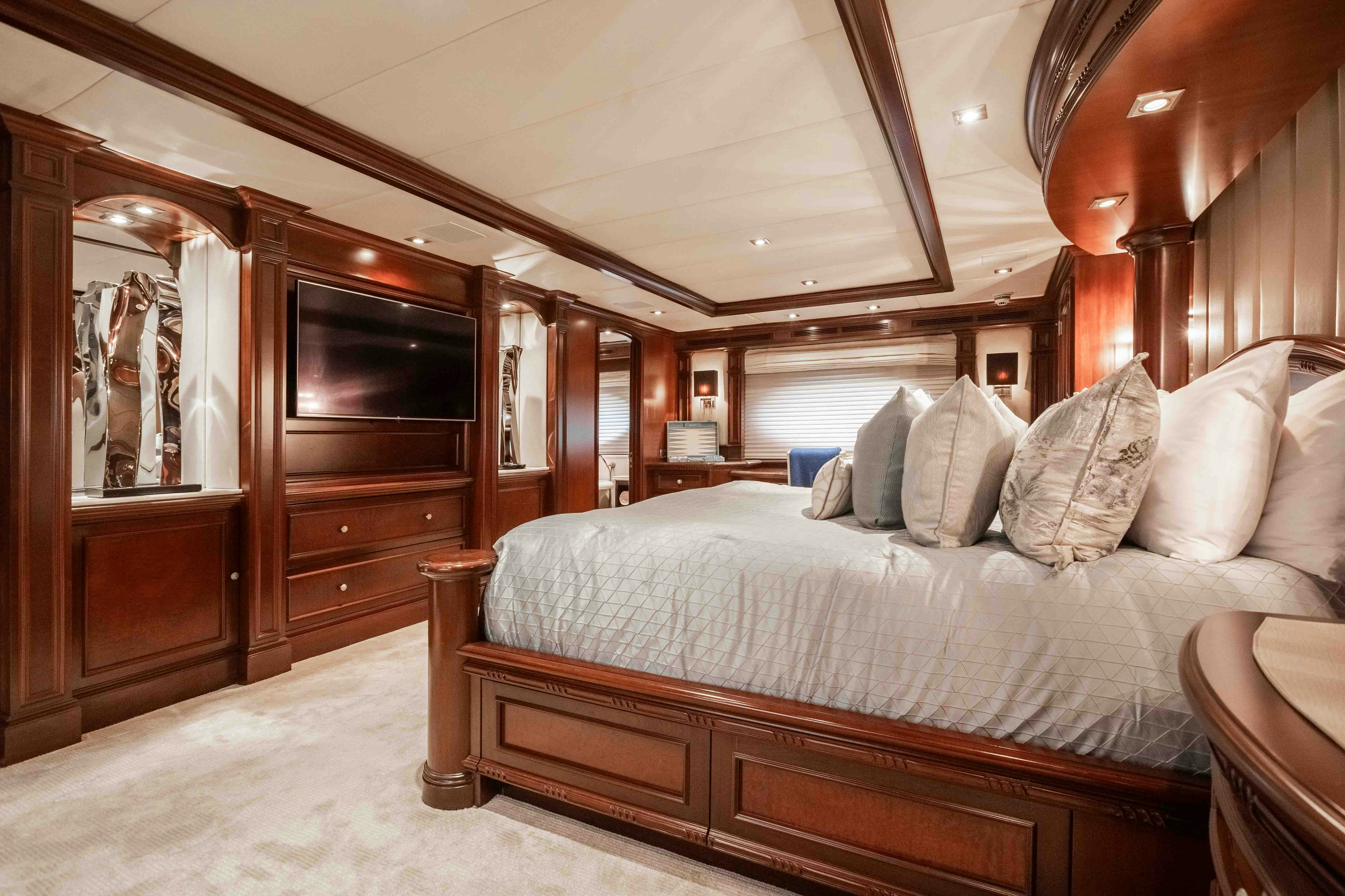 a bed in a room aboard MIRABELLA Yacht for Sale