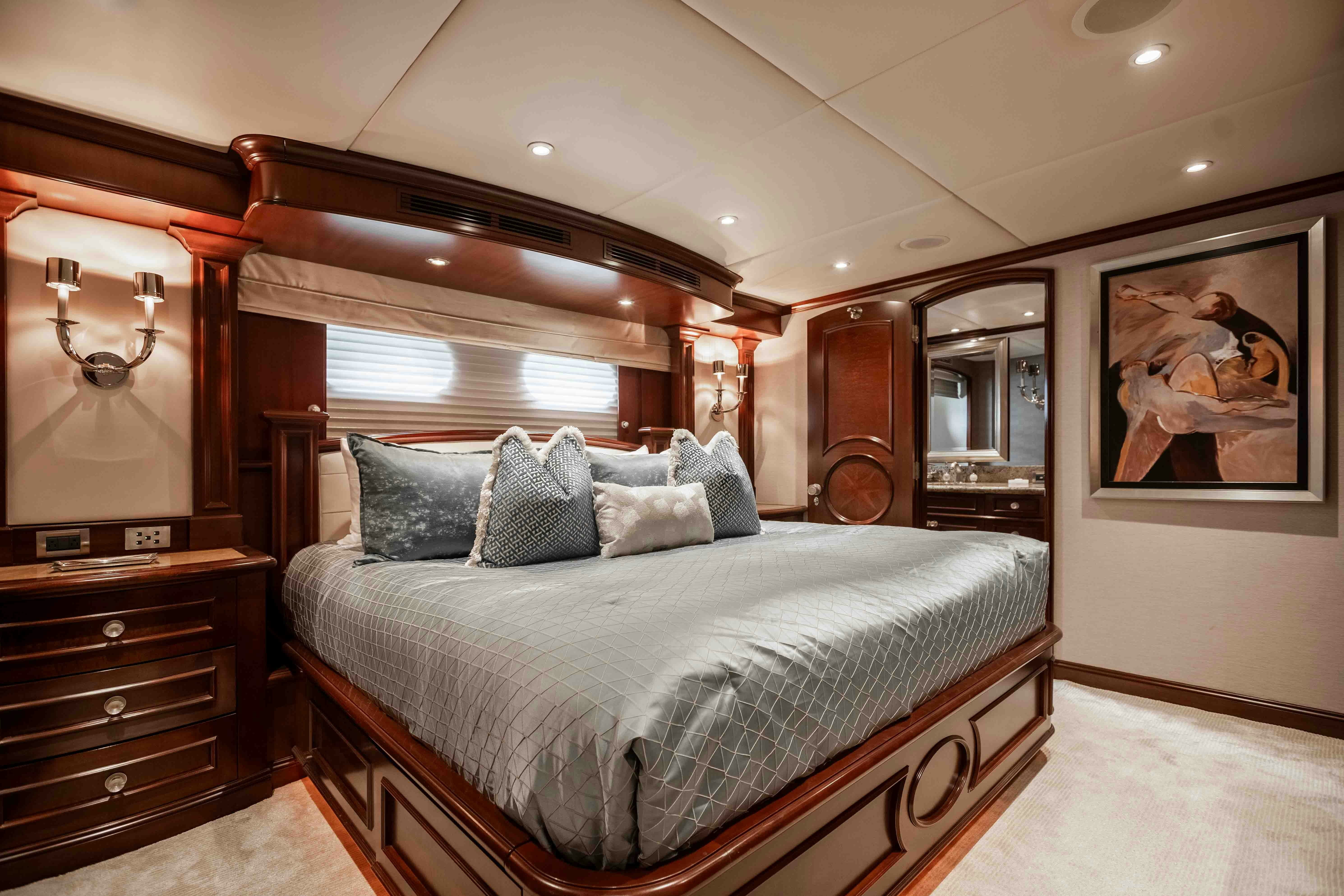 a bed in a room aboard MIRABELLA Yacht for Sale