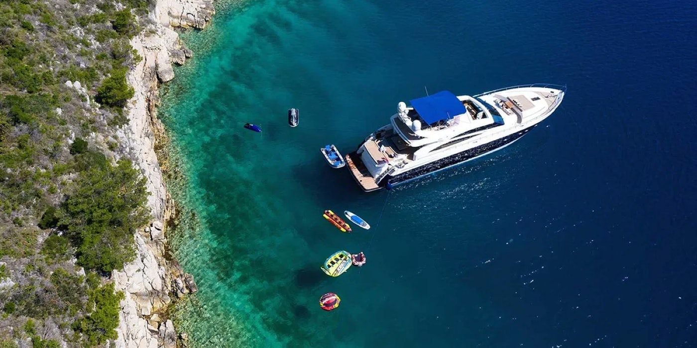 a group of people on a boat aboard AGAVE Yacht for Sale