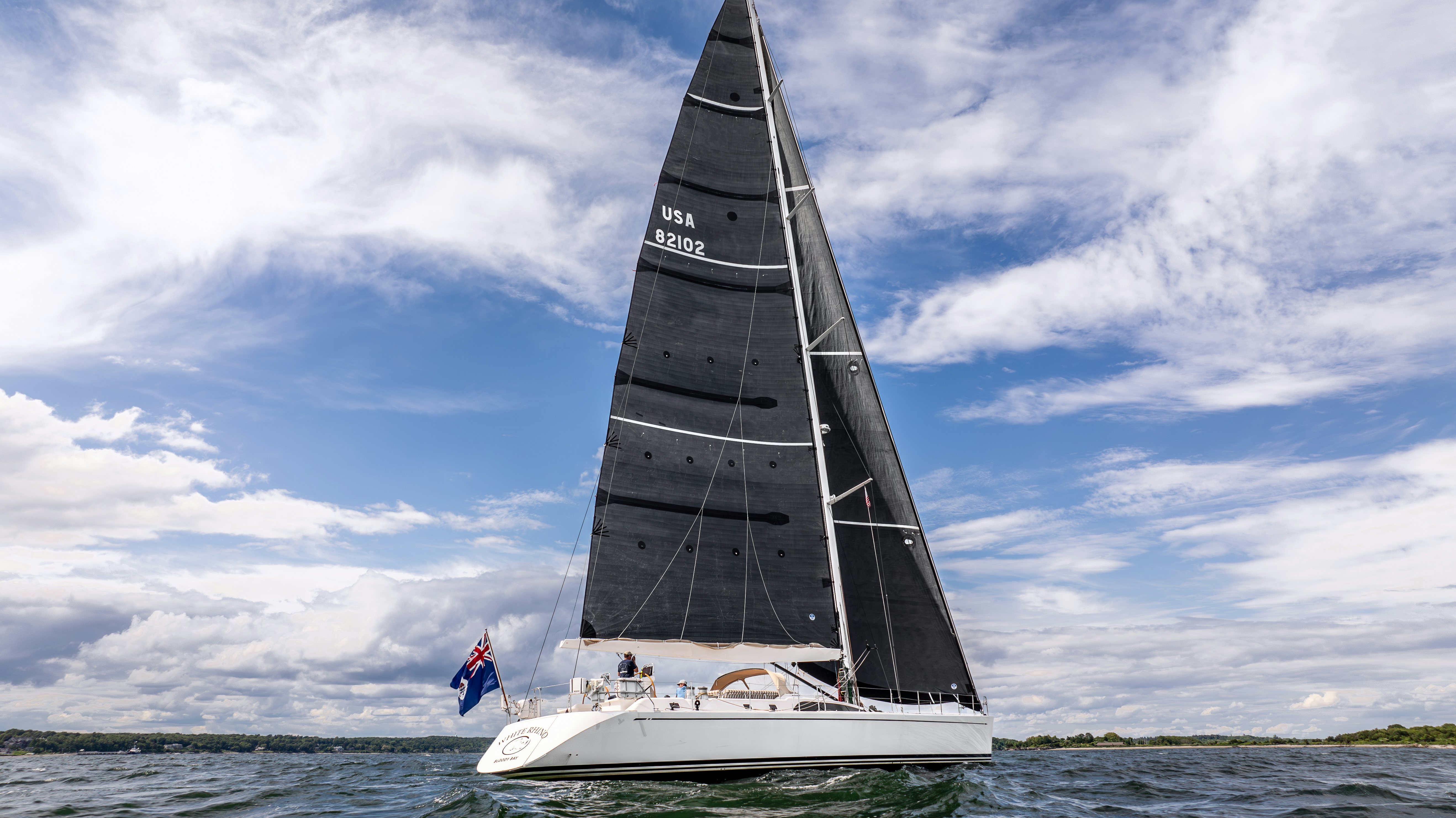 a sailboat on the water aboard WHITE RHINO Yacht for Sale