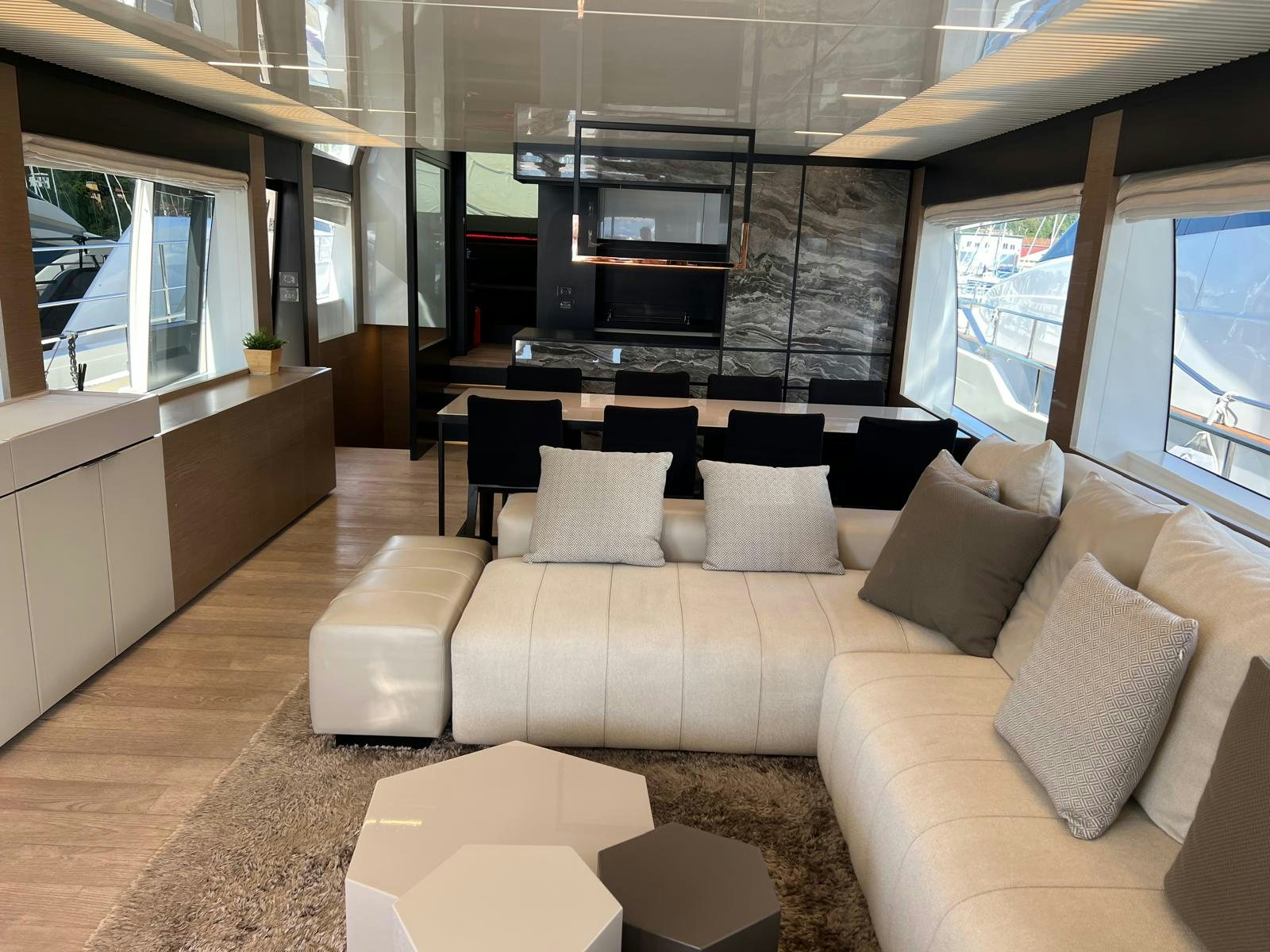 a living room with a couch and a tv aboard PICCOLINO Yacht for Sale