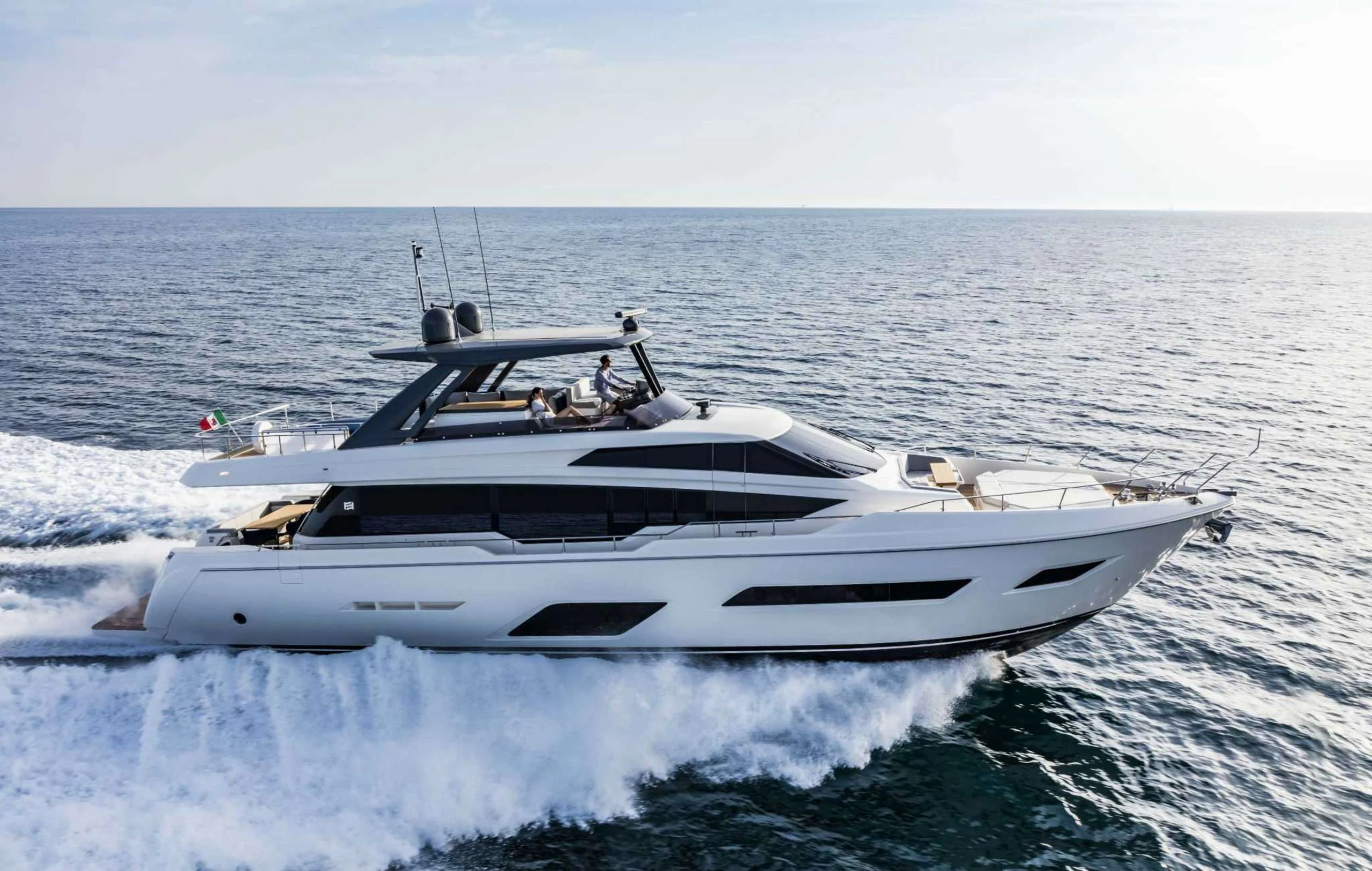 a white yacht on the water aboard PICCOLINO Yacht for Sale