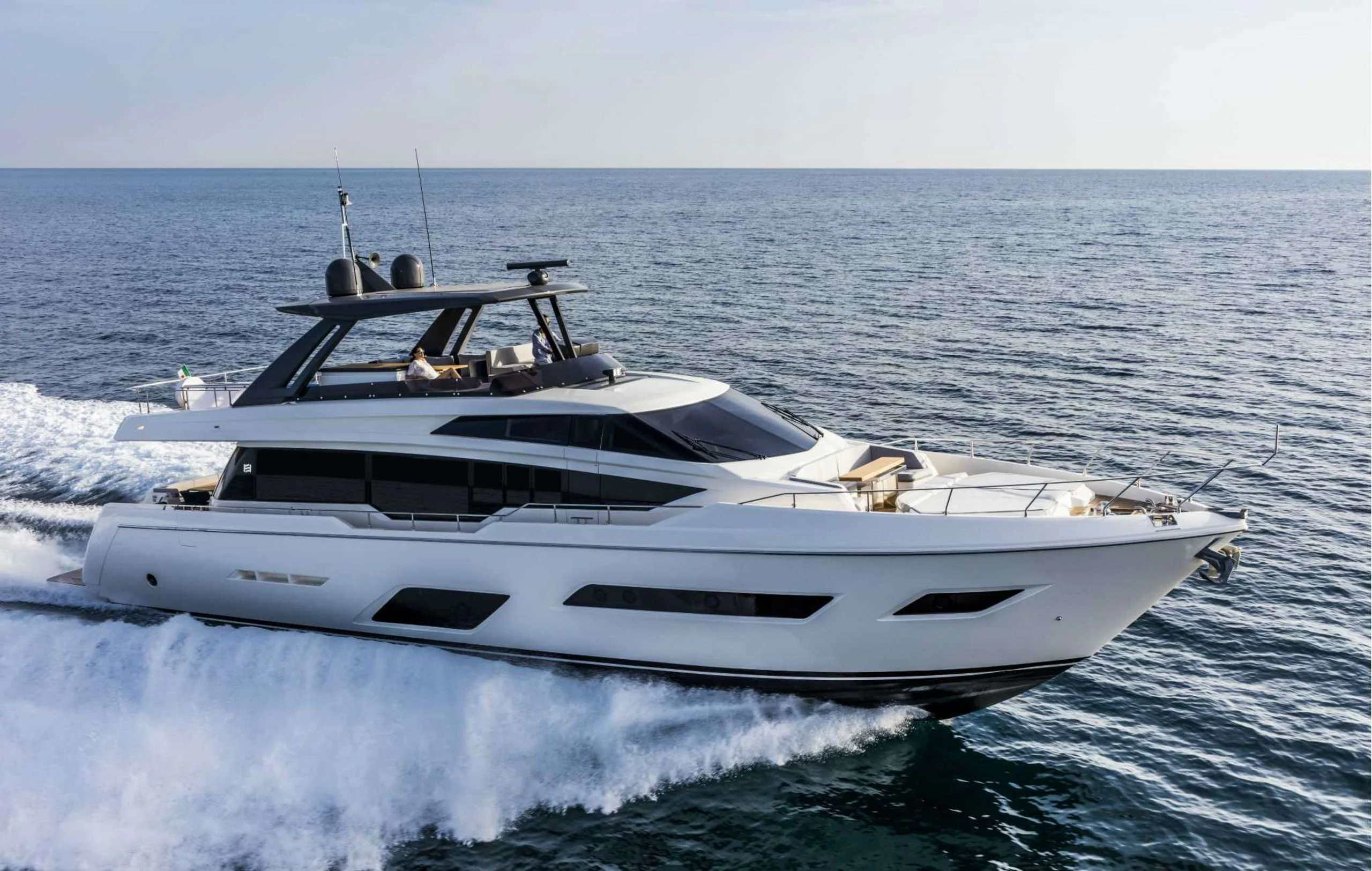 a white yacht on the water aboard PICCOLINO Yacht for Sale