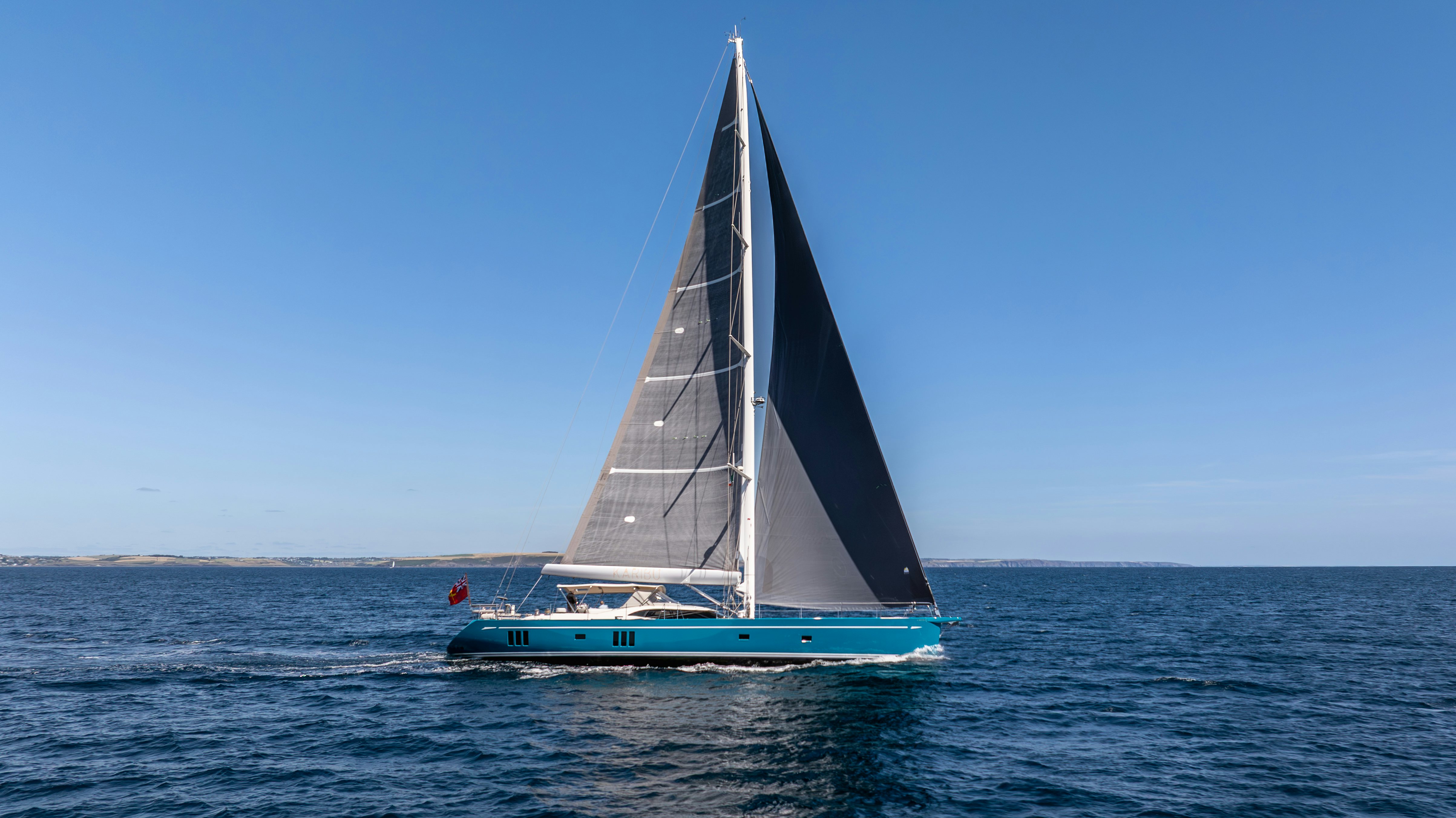 a sailboat in the water aboard KARIBU Yacht for Sale