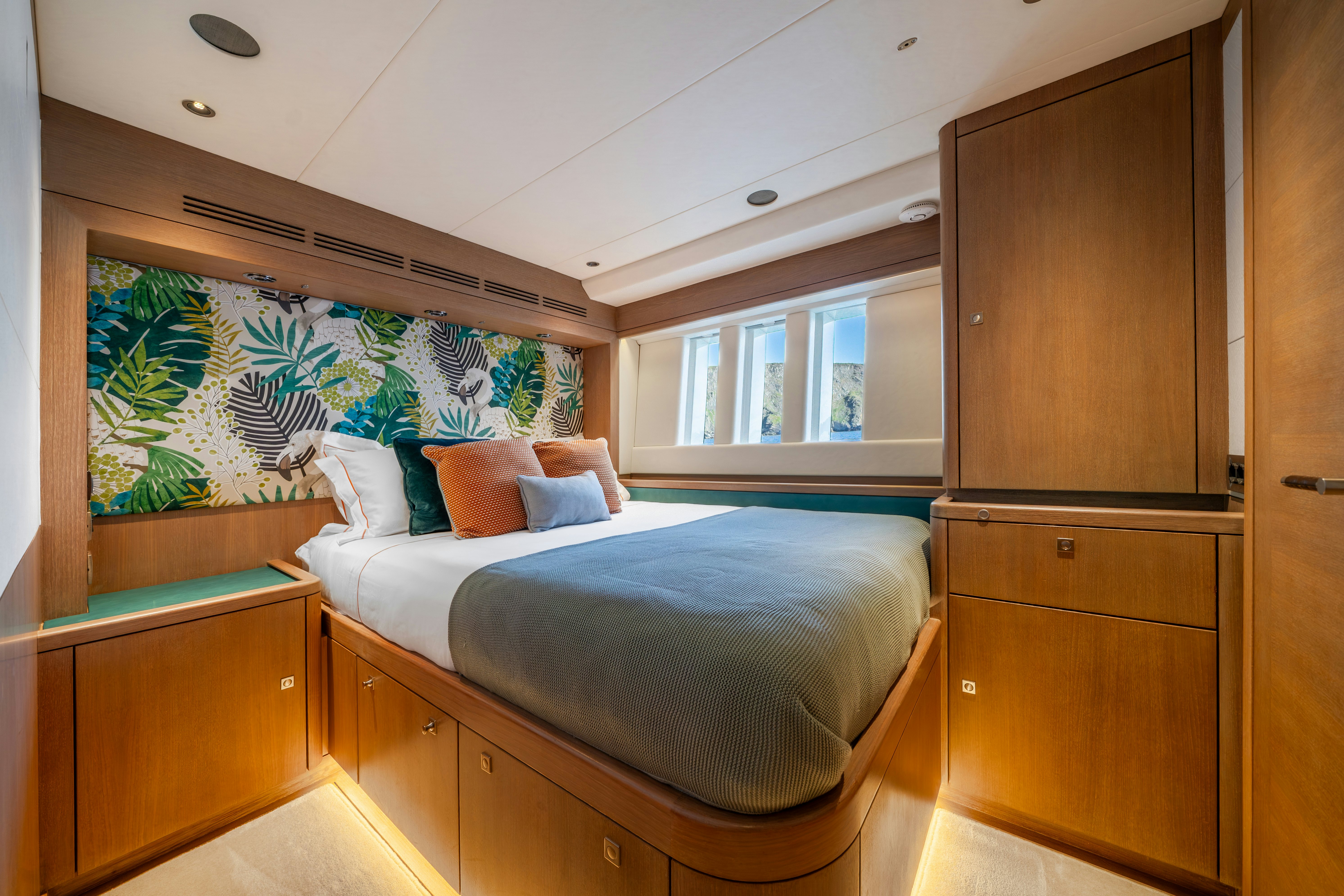 a bed in a room aboard KARIBU Yacht for Sale