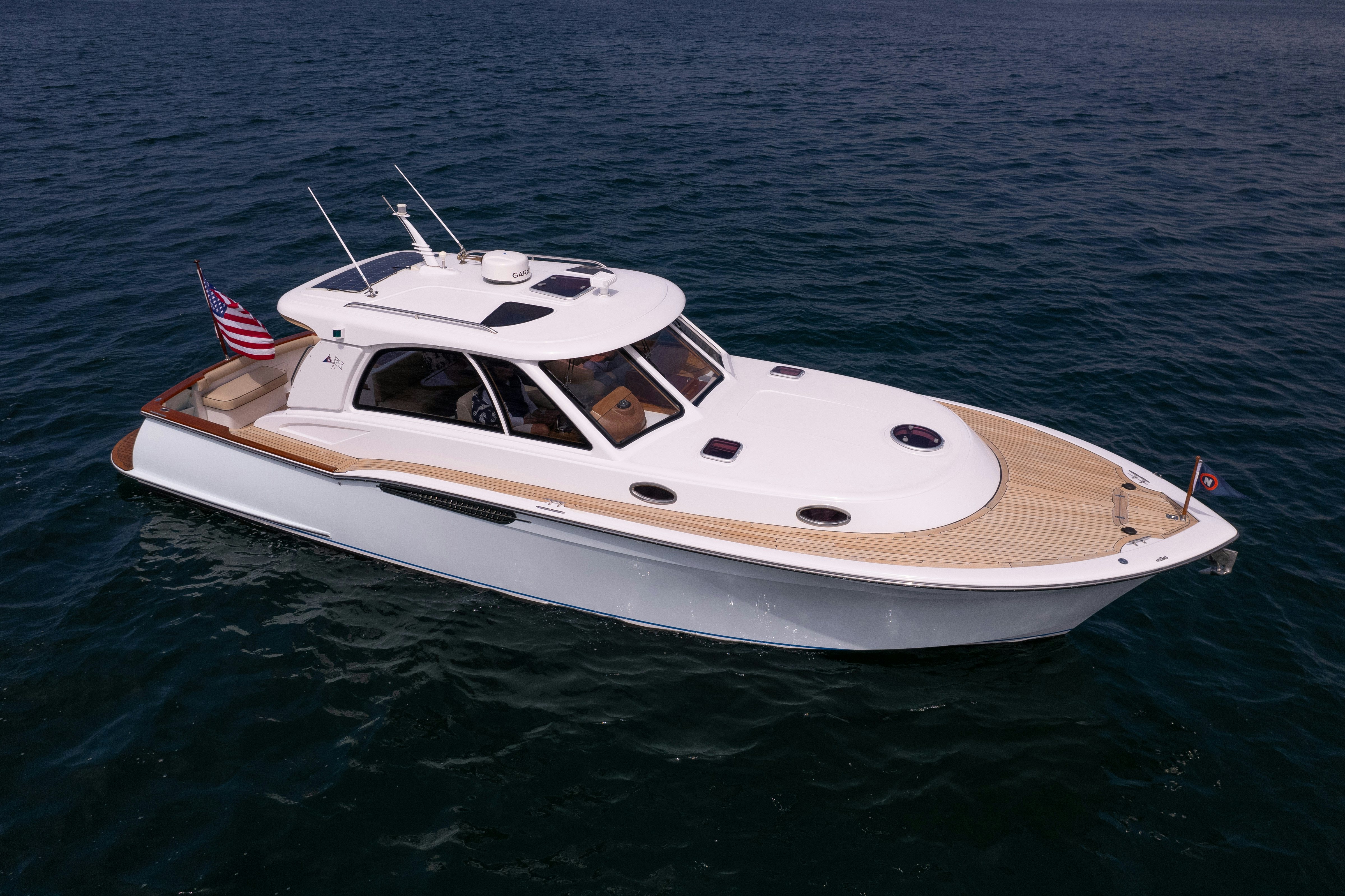 a white boat in the water aboard TRANQUILITY Yacht for Sale