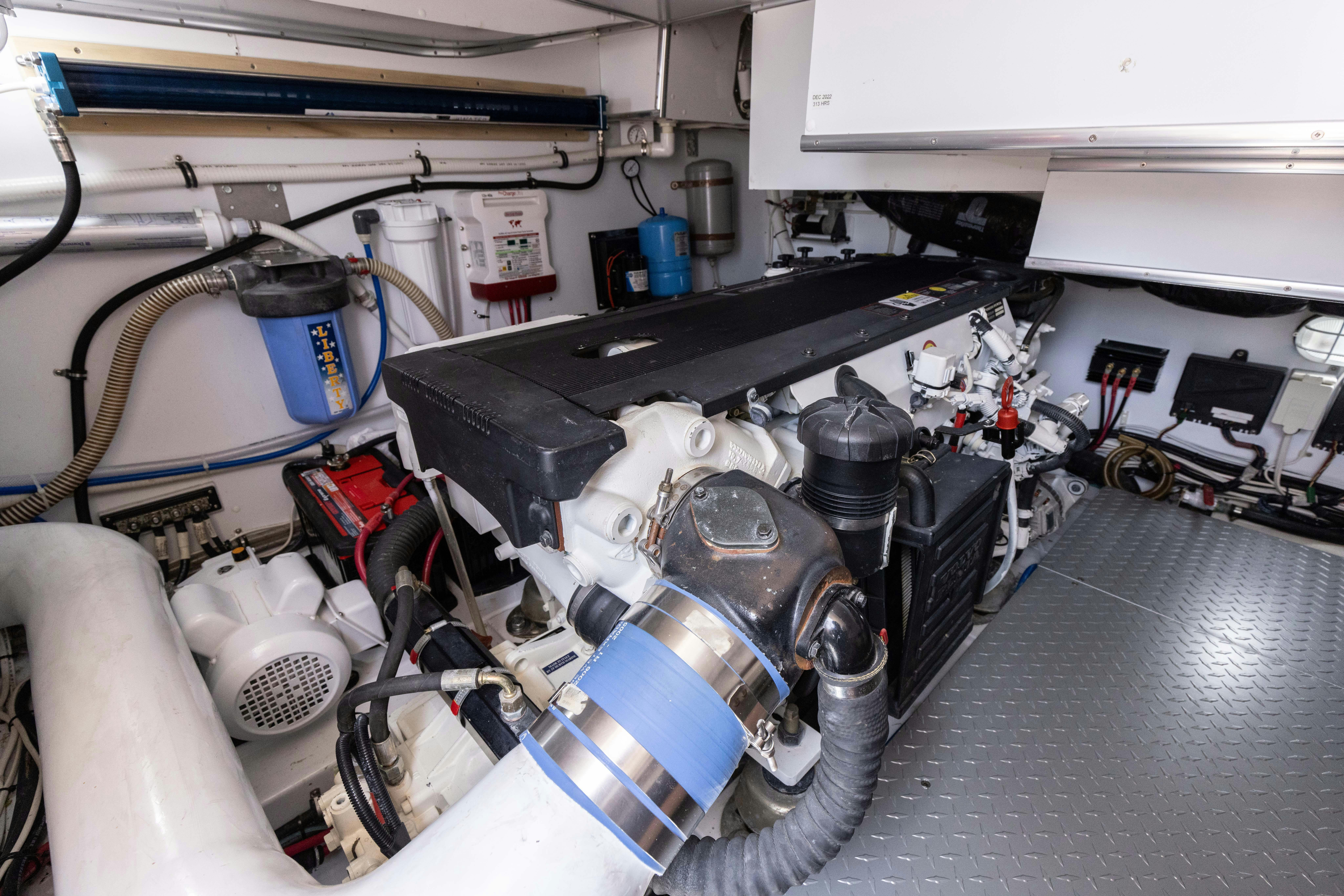 a car in a garage aboard TRANQUILITY Yacht for Sale