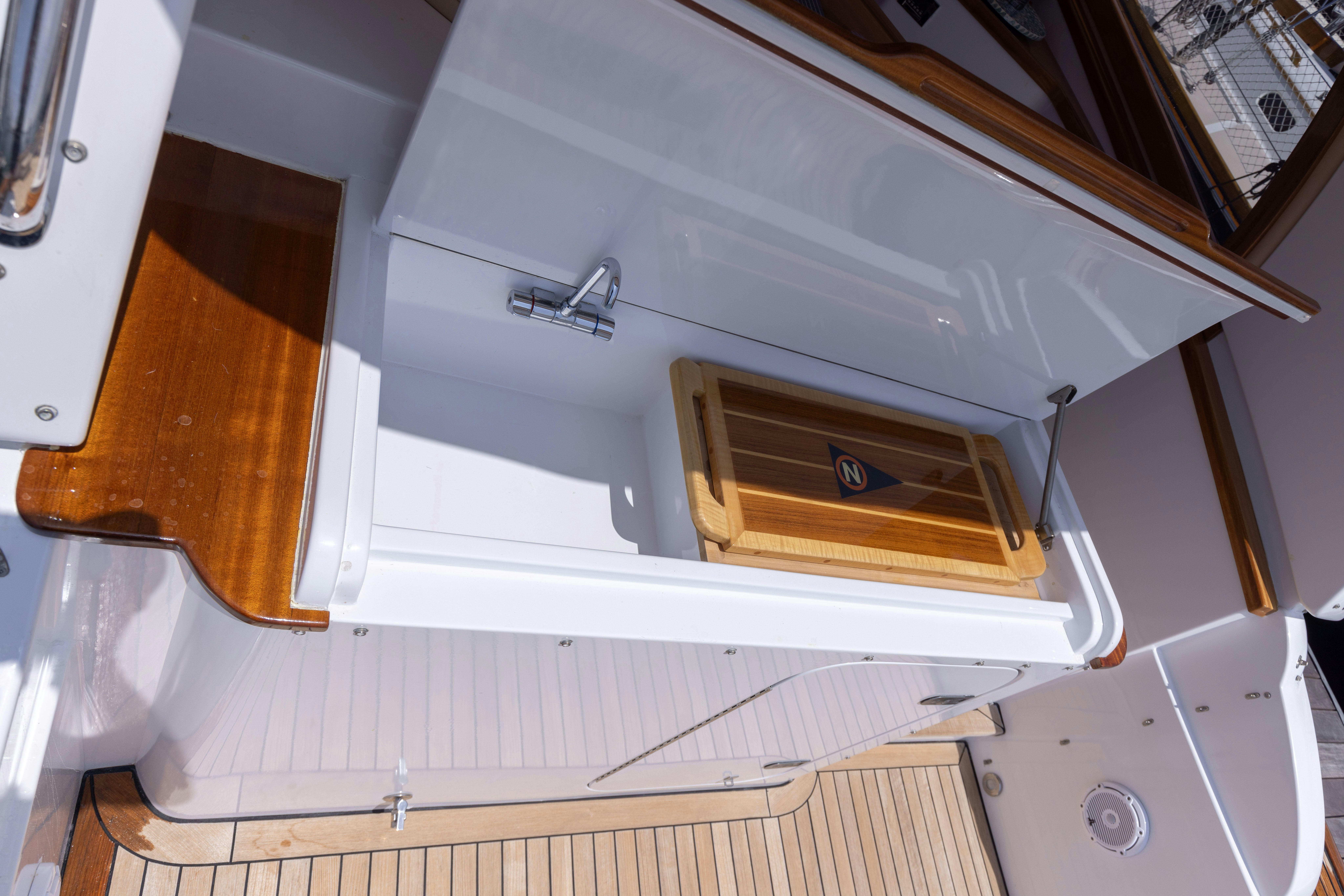 a white cabinet with a vent aboard TRANQUILITY Yacht for Sale