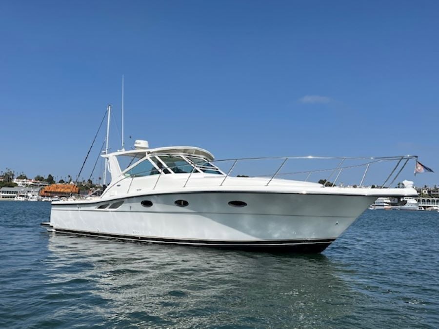 a white boat in the water aboard NIMMO Yacht for Sale