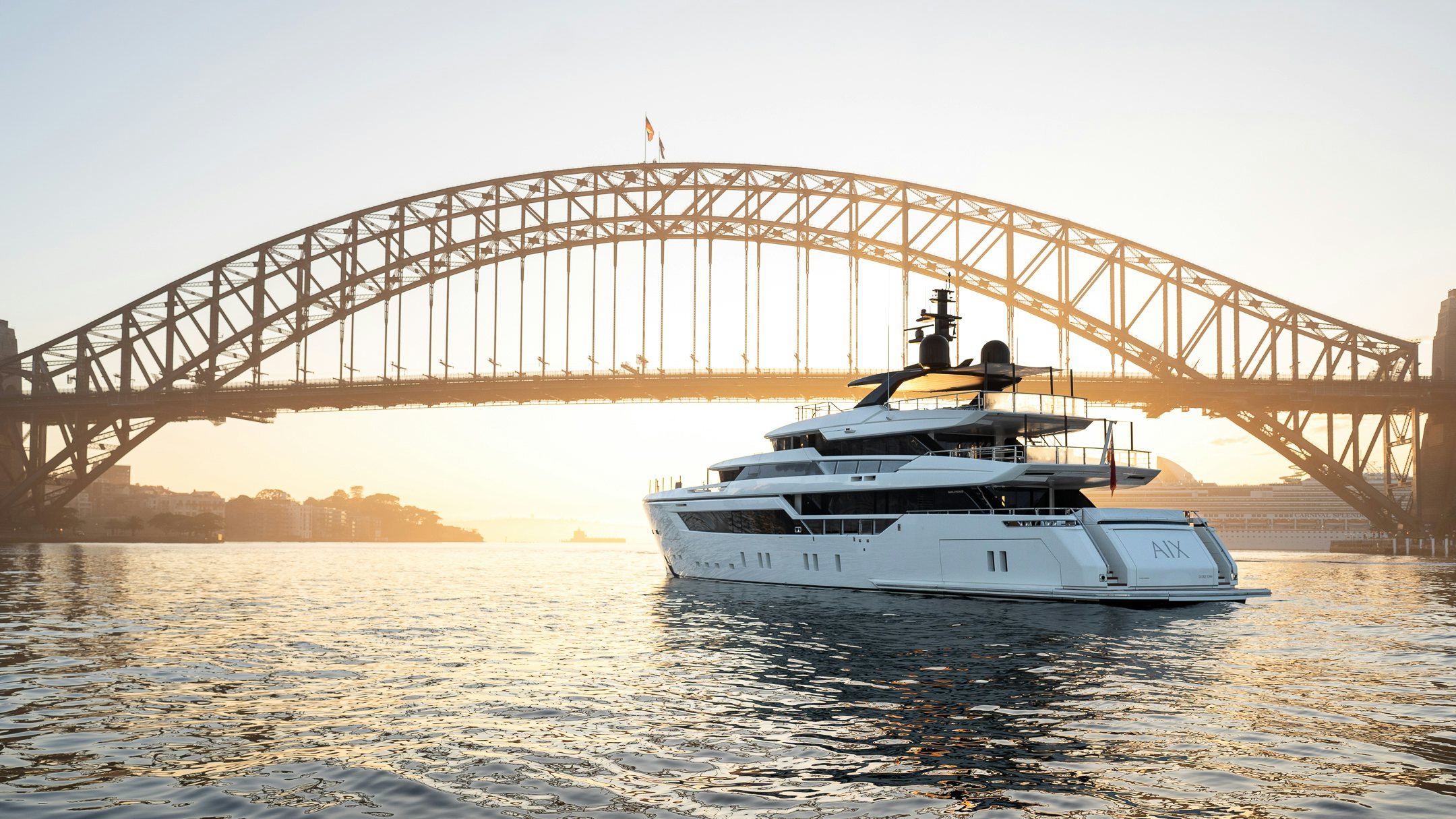 a boat under a bridge aboard AIX Yacht for Charter