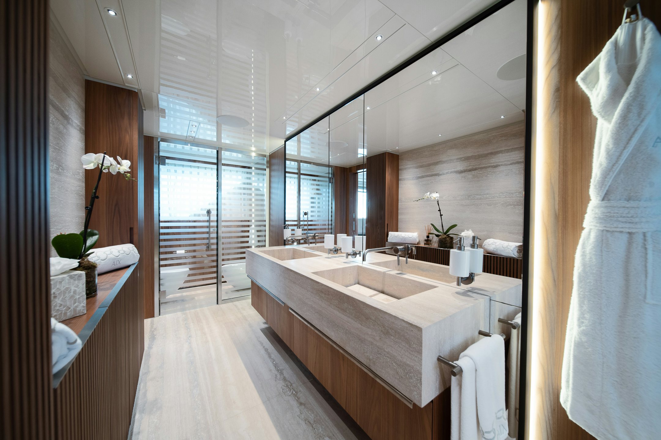 a bathroom with a large tub aboard AIX Yacht for Charter