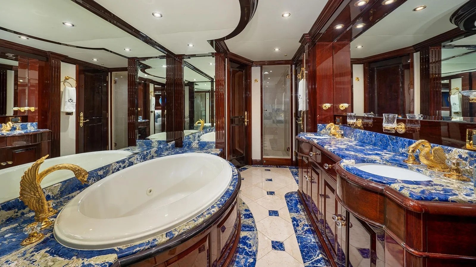 a large bathroom with a large jacuzzi tub aboard IONIAN PRINCESS Yacht for Sale