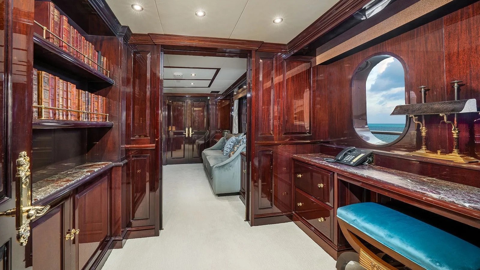 a room with a desk and chairs aboard IONIAN PRINCESS Yacht for Sale