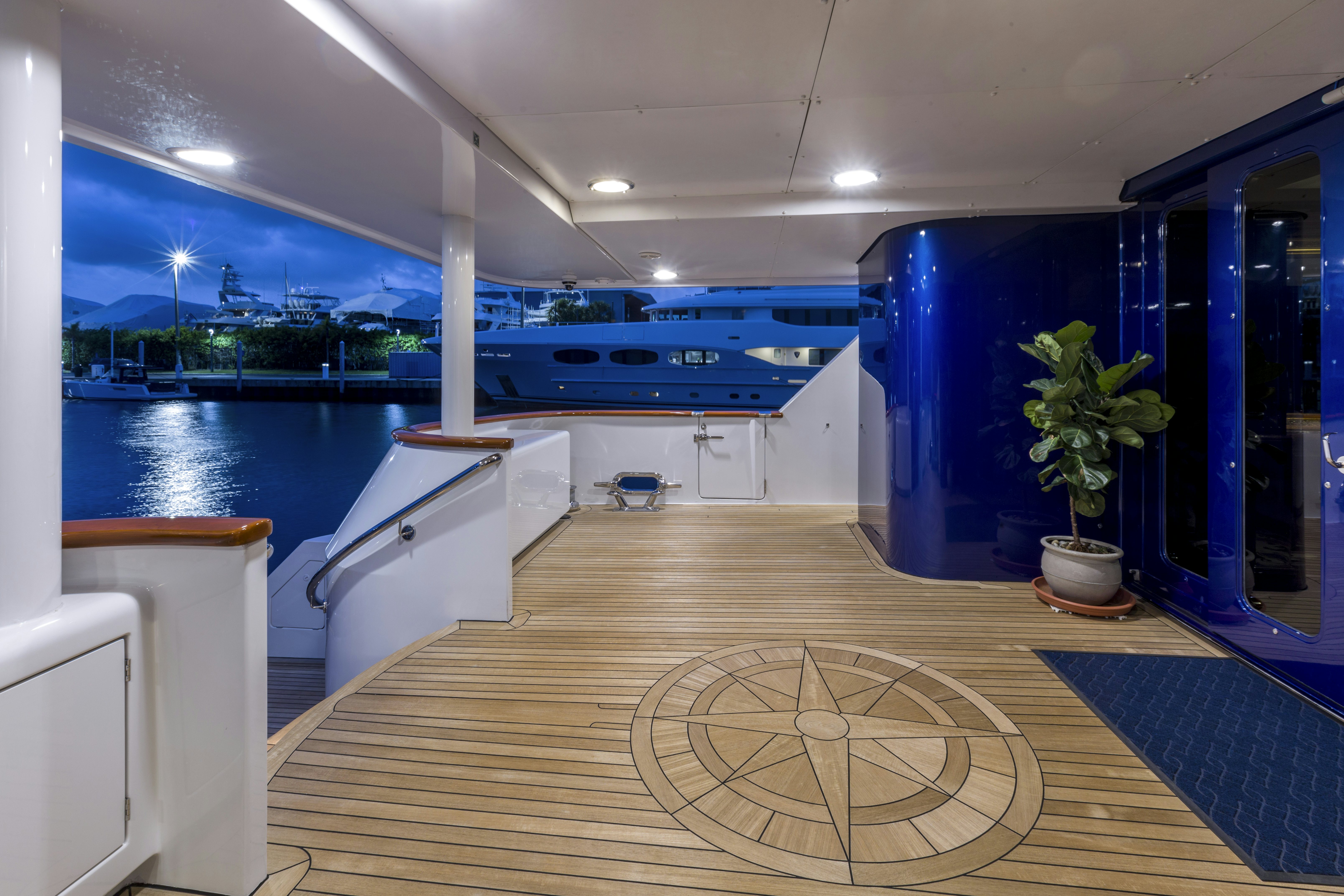 a large room with a wood floor and a pool aboard IONIAN PRINCESS Yacht for Sale