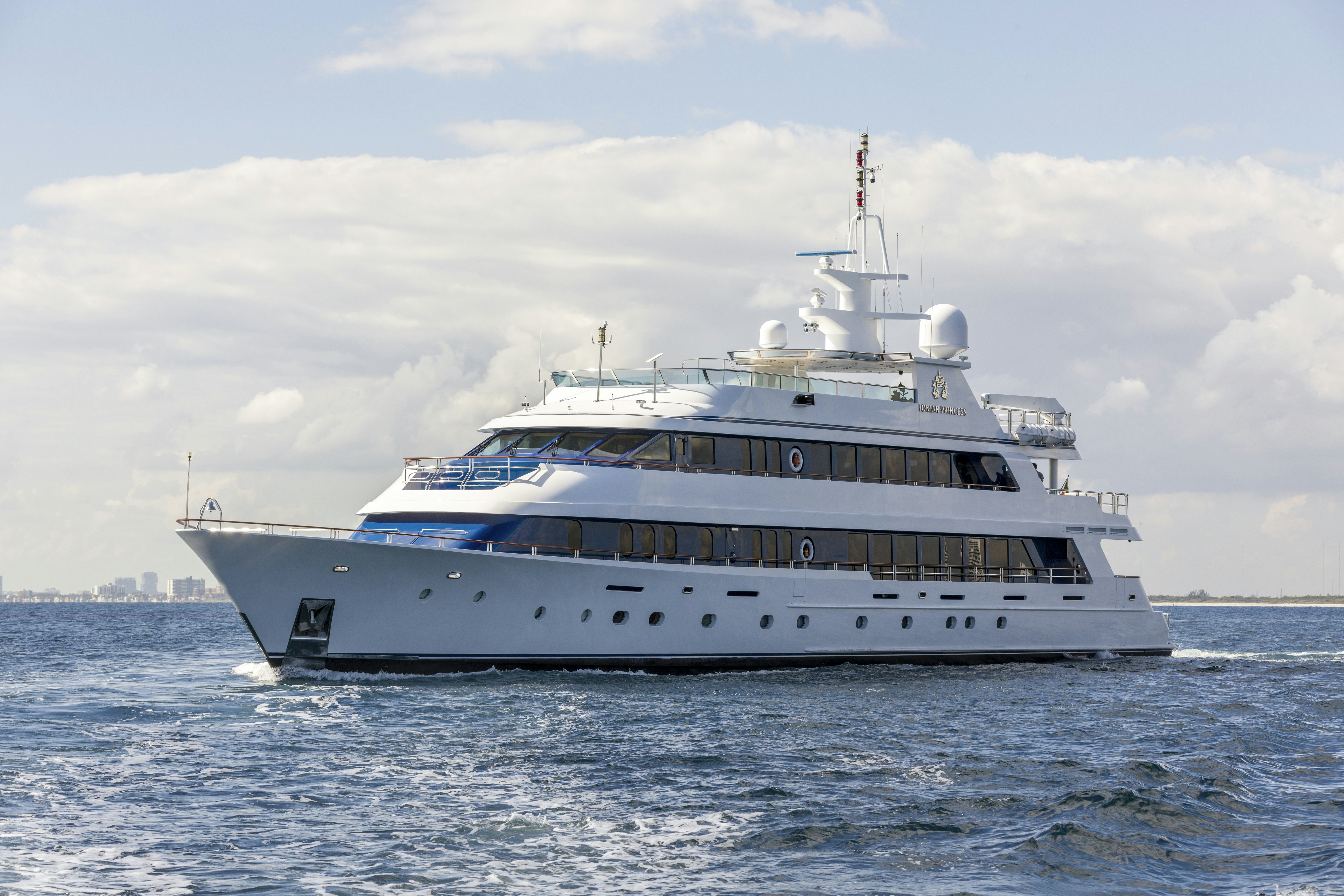 a large white boat in the water aboard IONIAN PRINCESS Yacht for Sale
