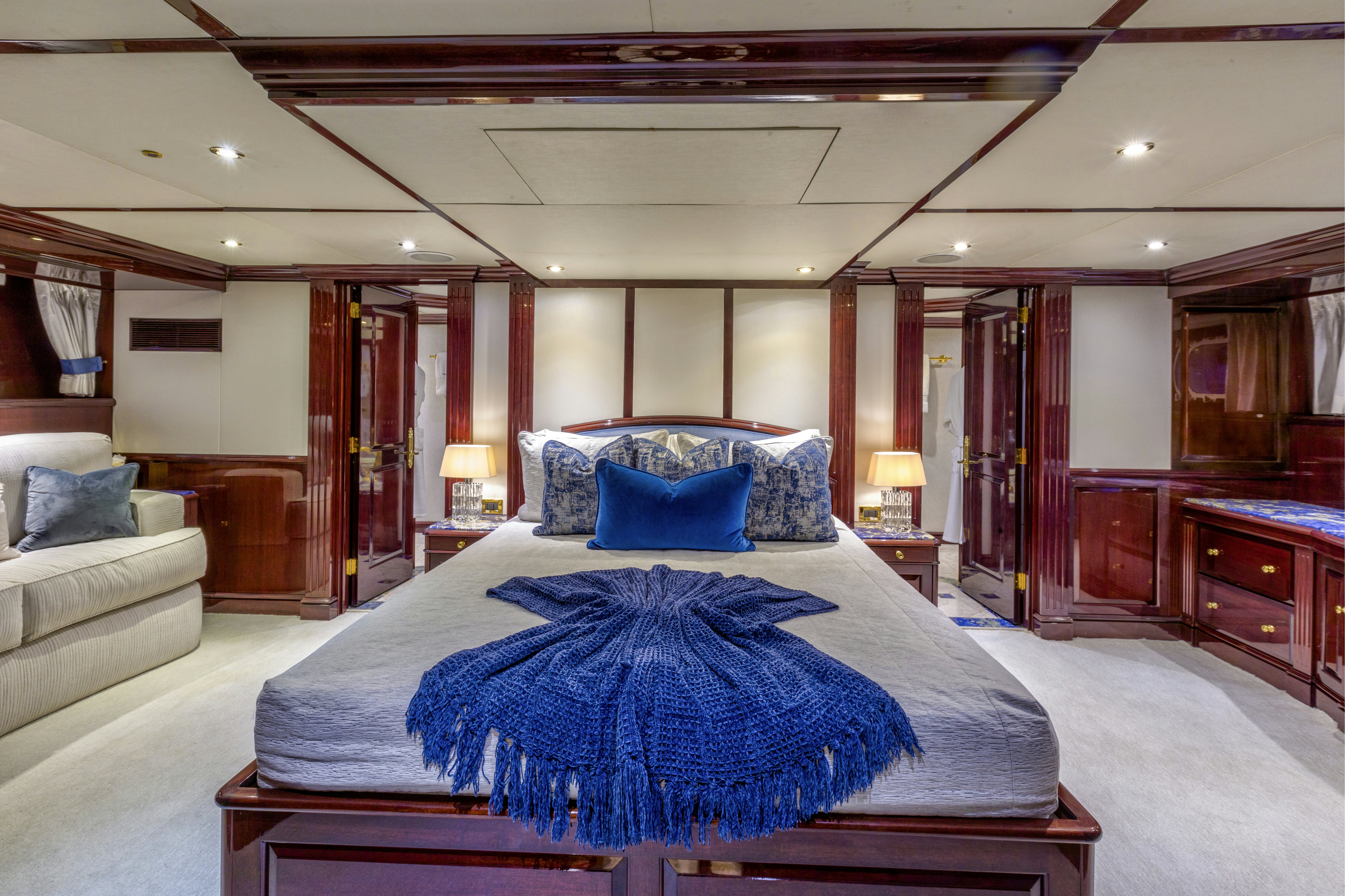 a large bedroom with a large bed aboard IONIAN PRINCESS Yacht for Sale