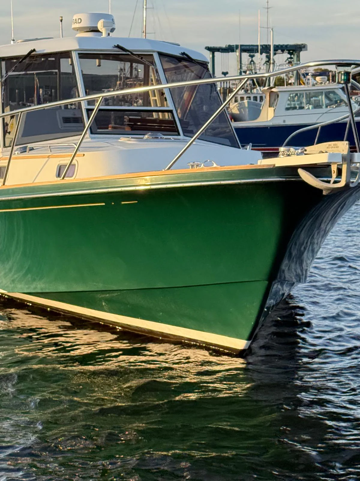 a couple of boats sit in the water aboard LARK Yacht for Sale