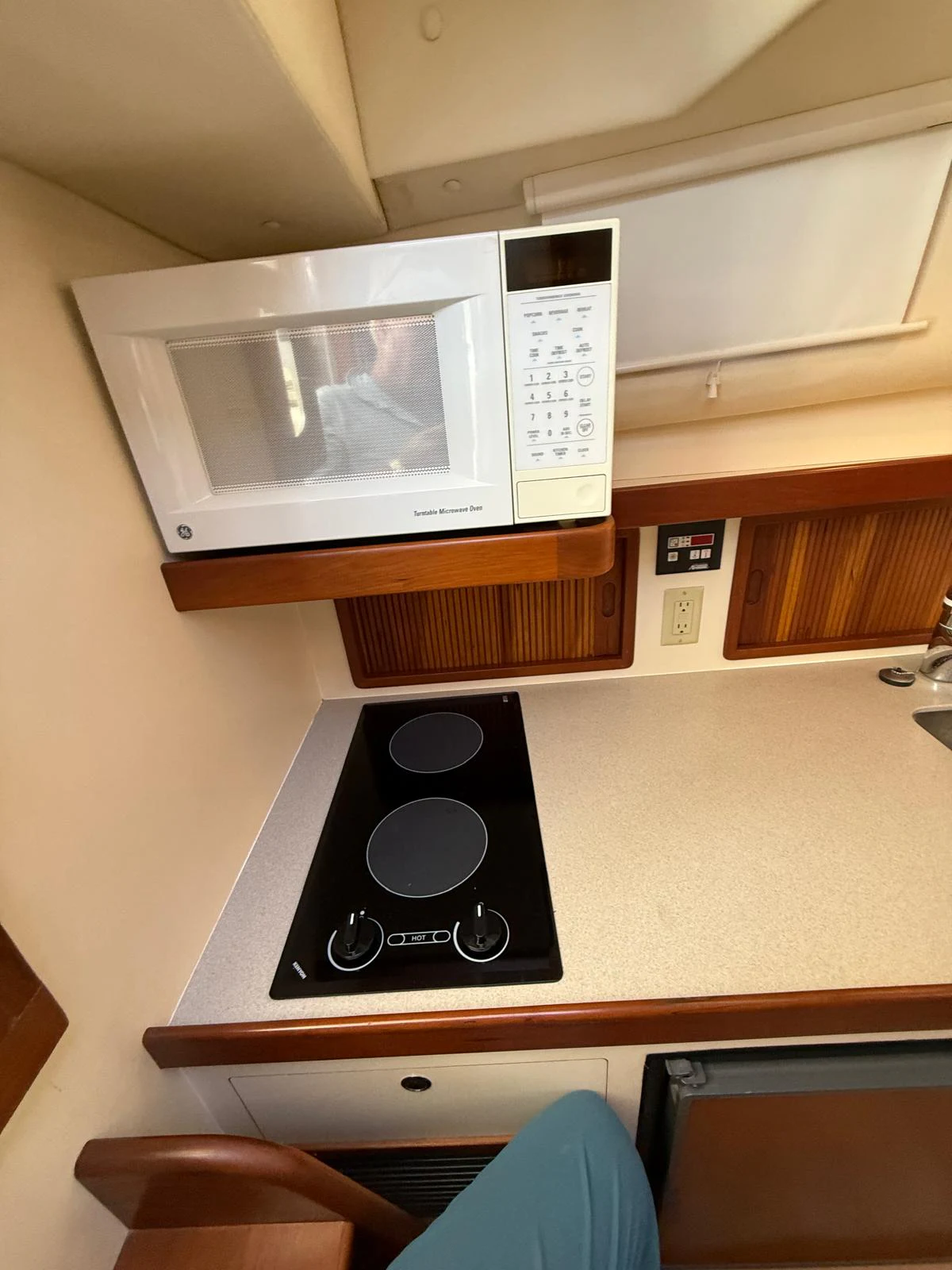 a microwave oven on a counter aboard LARK Yacht for Sale