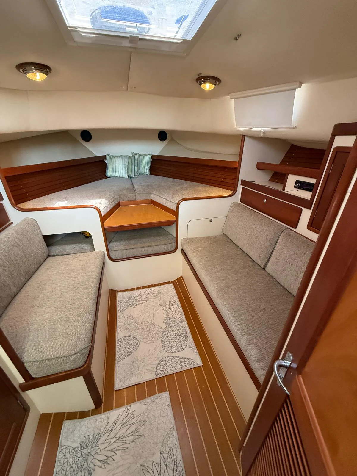 a room with wooden stairs aboard LARK Yacht for Sale