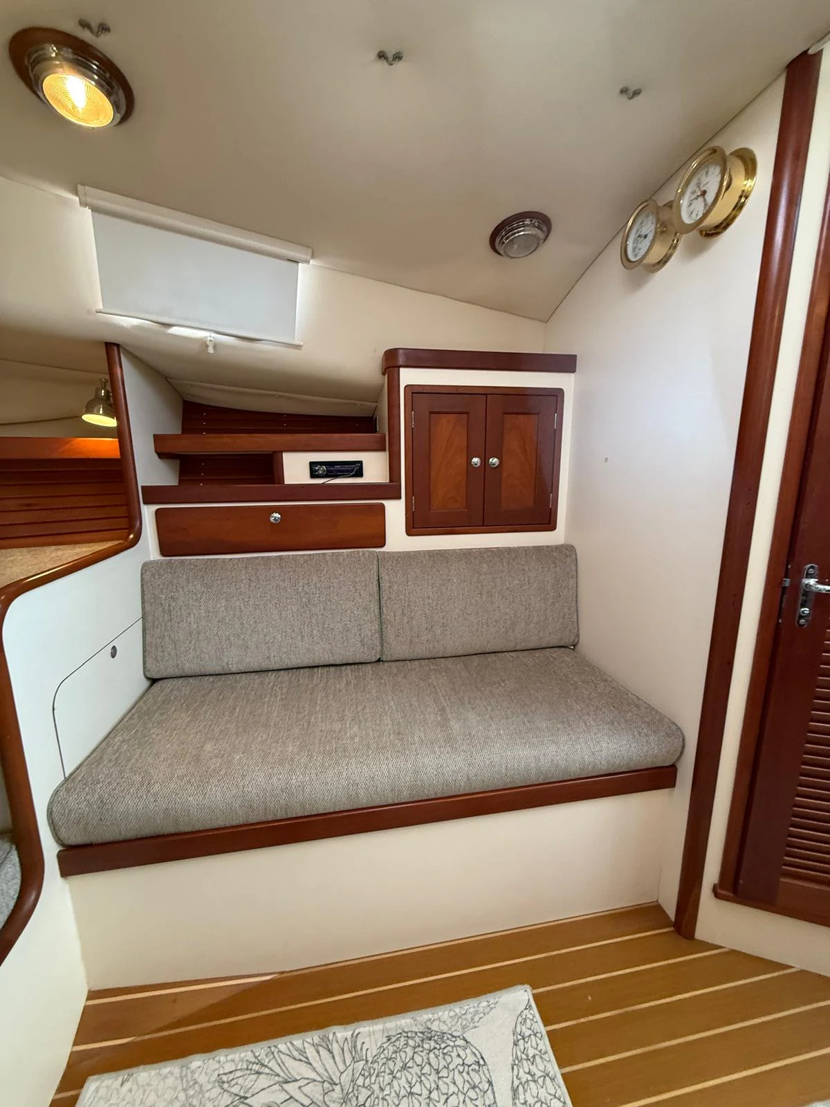 a couch in a room aboard LARK Yacht for Sale