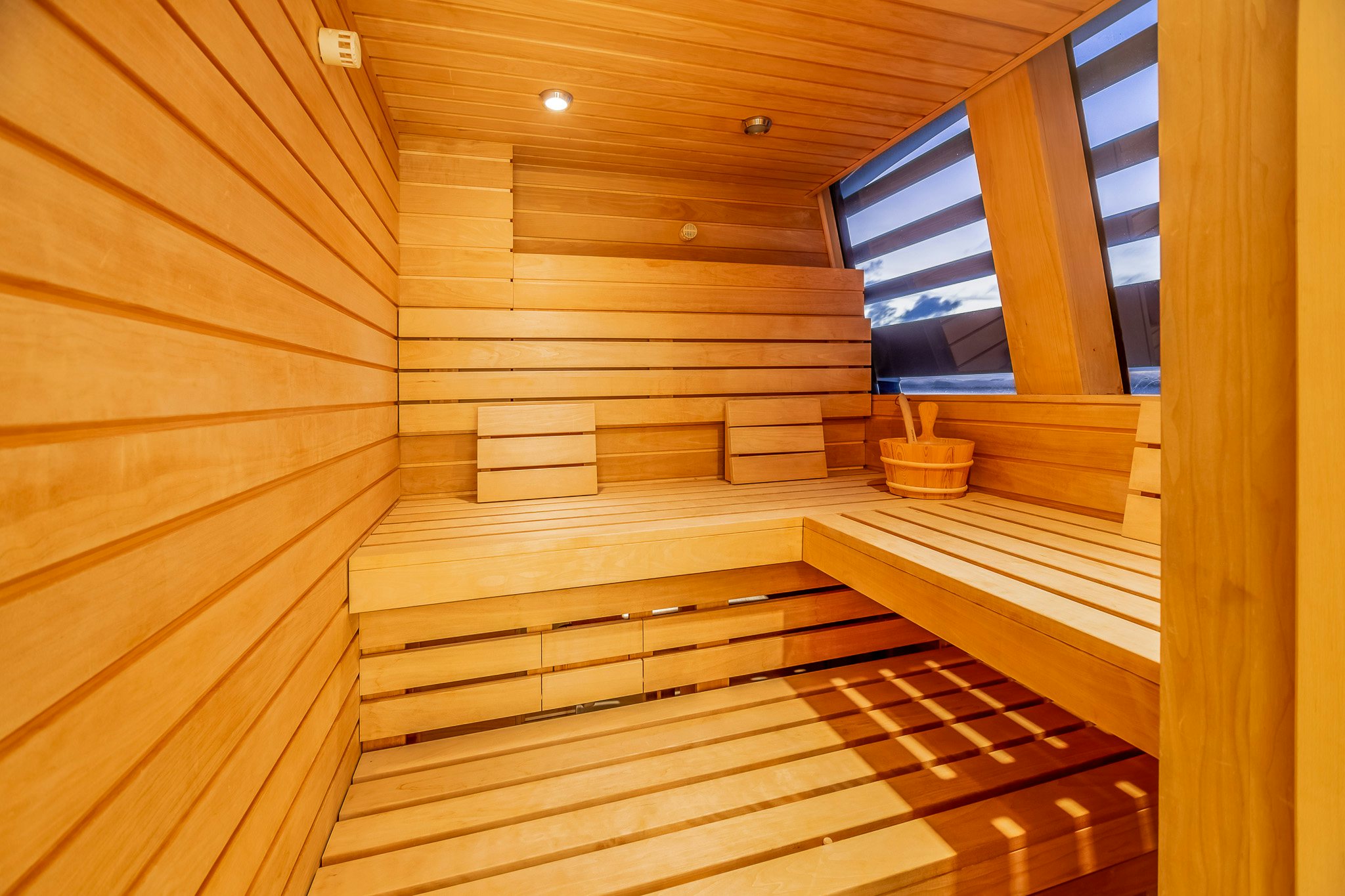 a wooden staircase in a house aboard LADY KATHRYN V Yacht for Charter