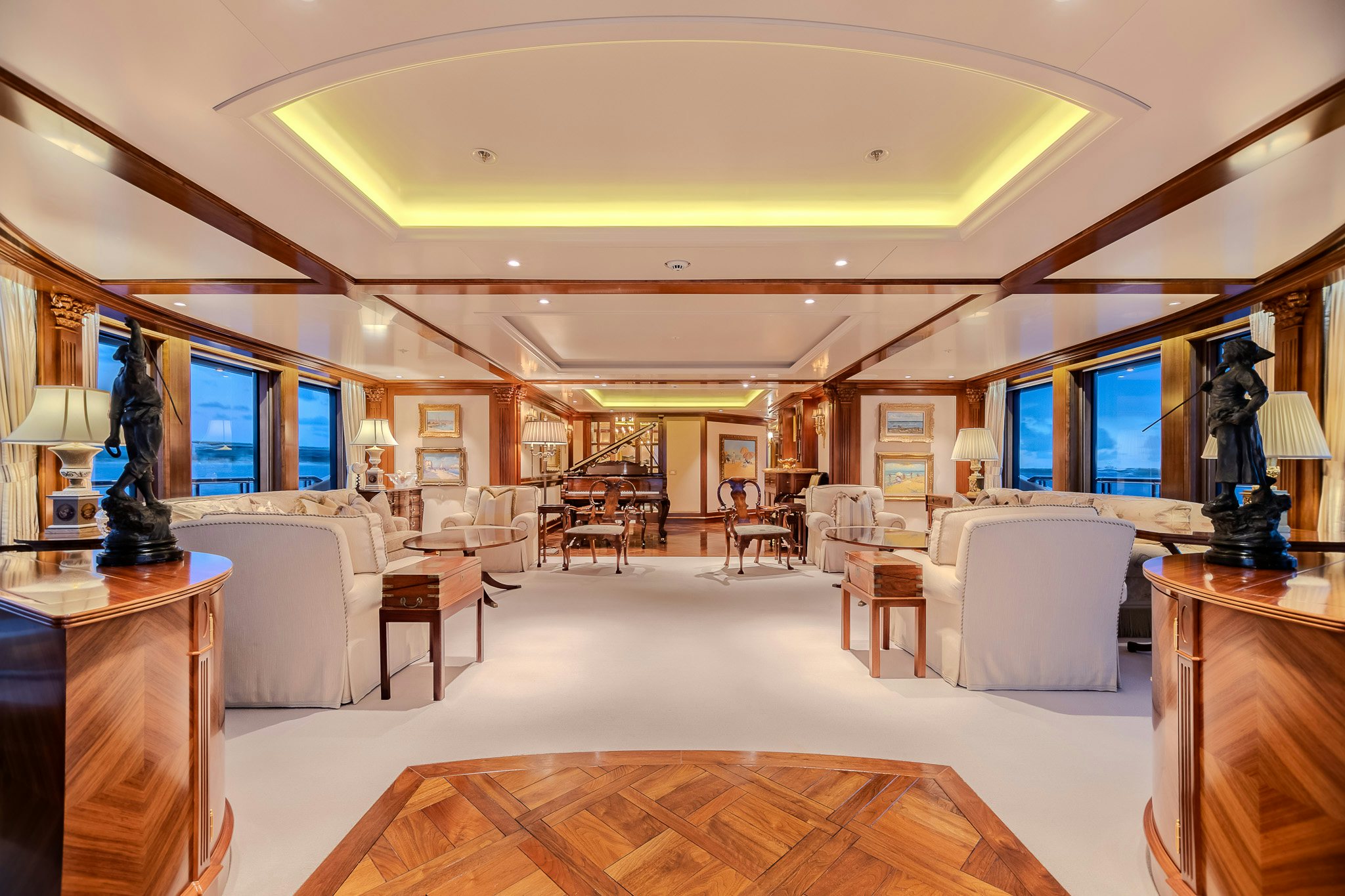 a living room with a large screen aboard LADY KATHRYN V Yacht for Charter