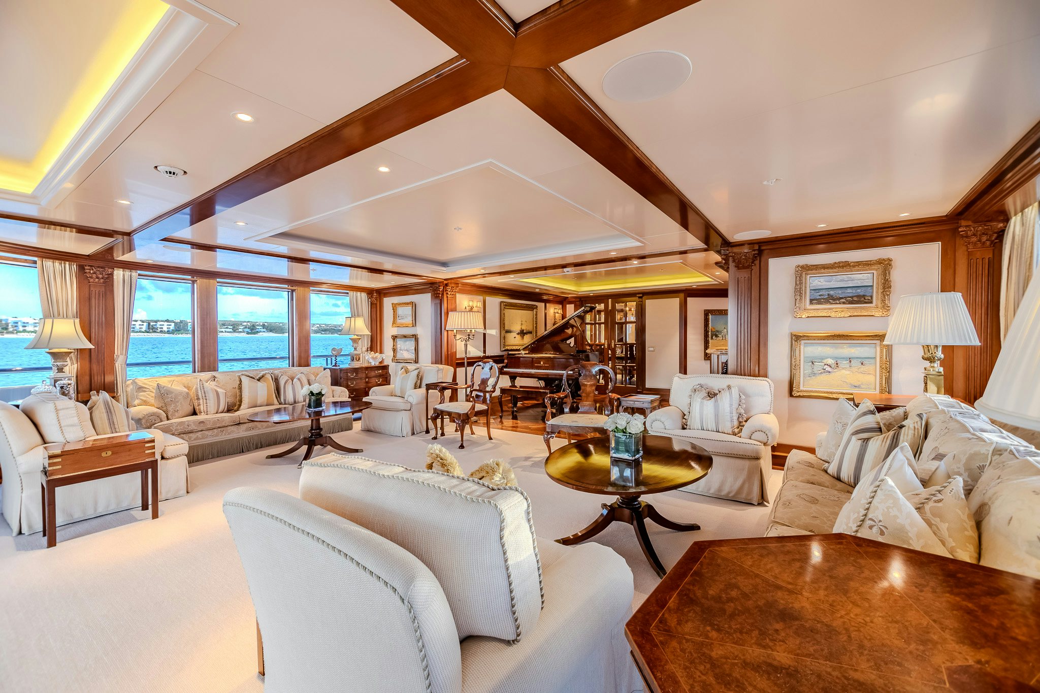 a living room with a large open window aboard LADY KATHRYN V Yacht for Charter
