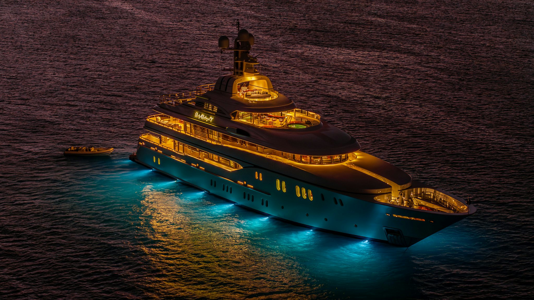 a large yellow boat aboard LADY KATHRYN V Yacht for Charter
