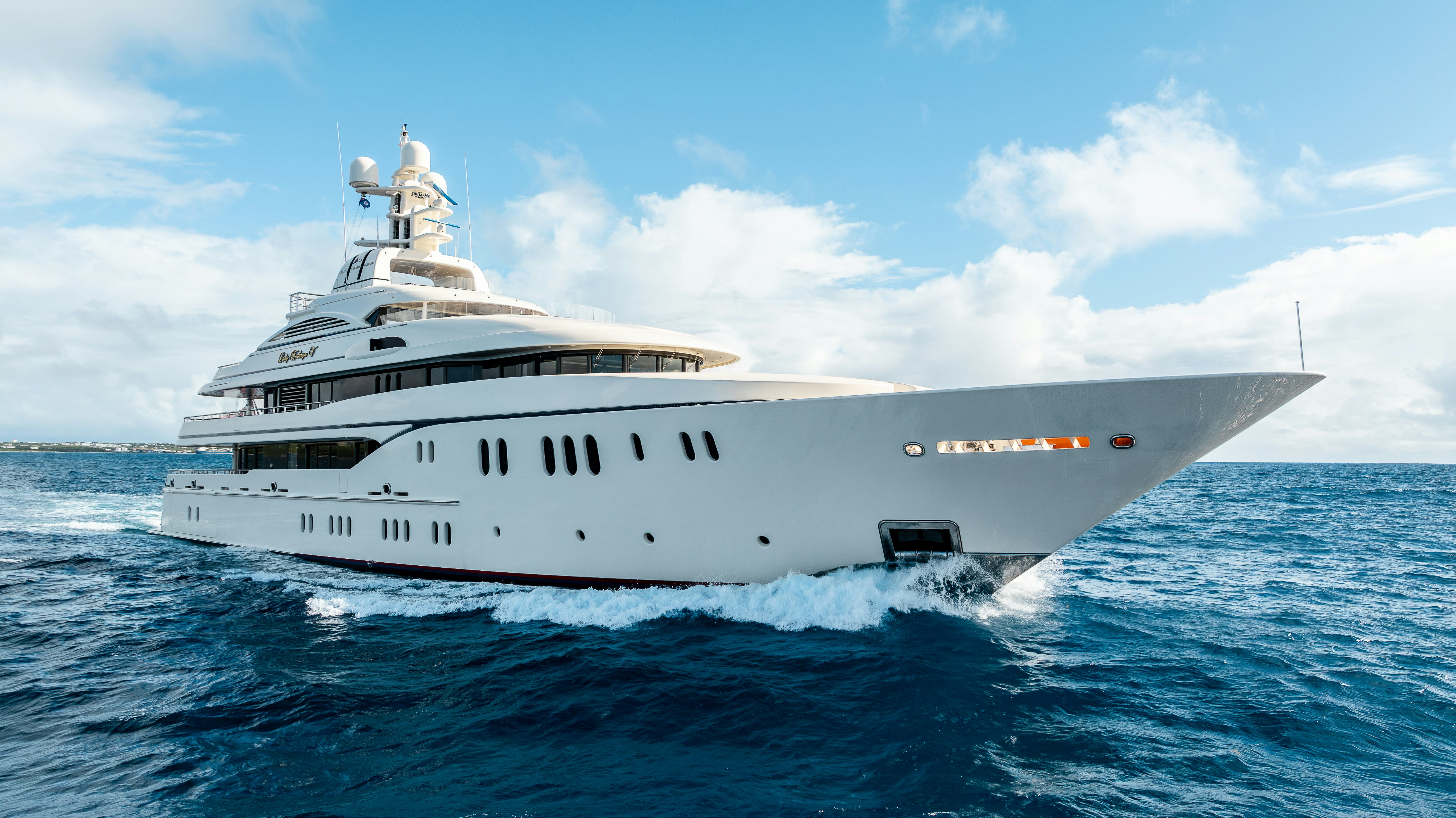 a large white ship aboard LADY KATHRYN V Yacht for Charter