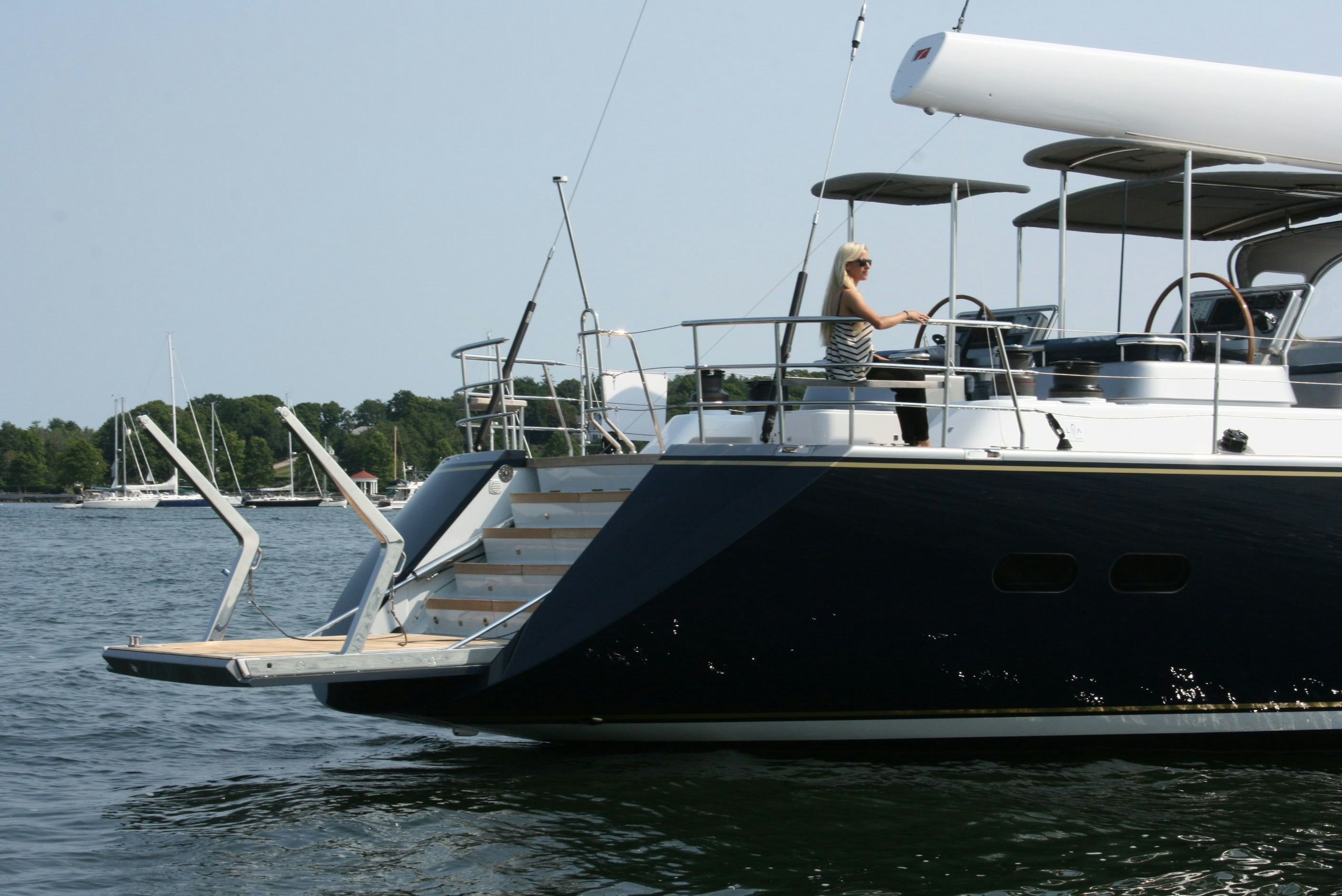 a couple people on a boat aboard ASSAI Yacht for Sale