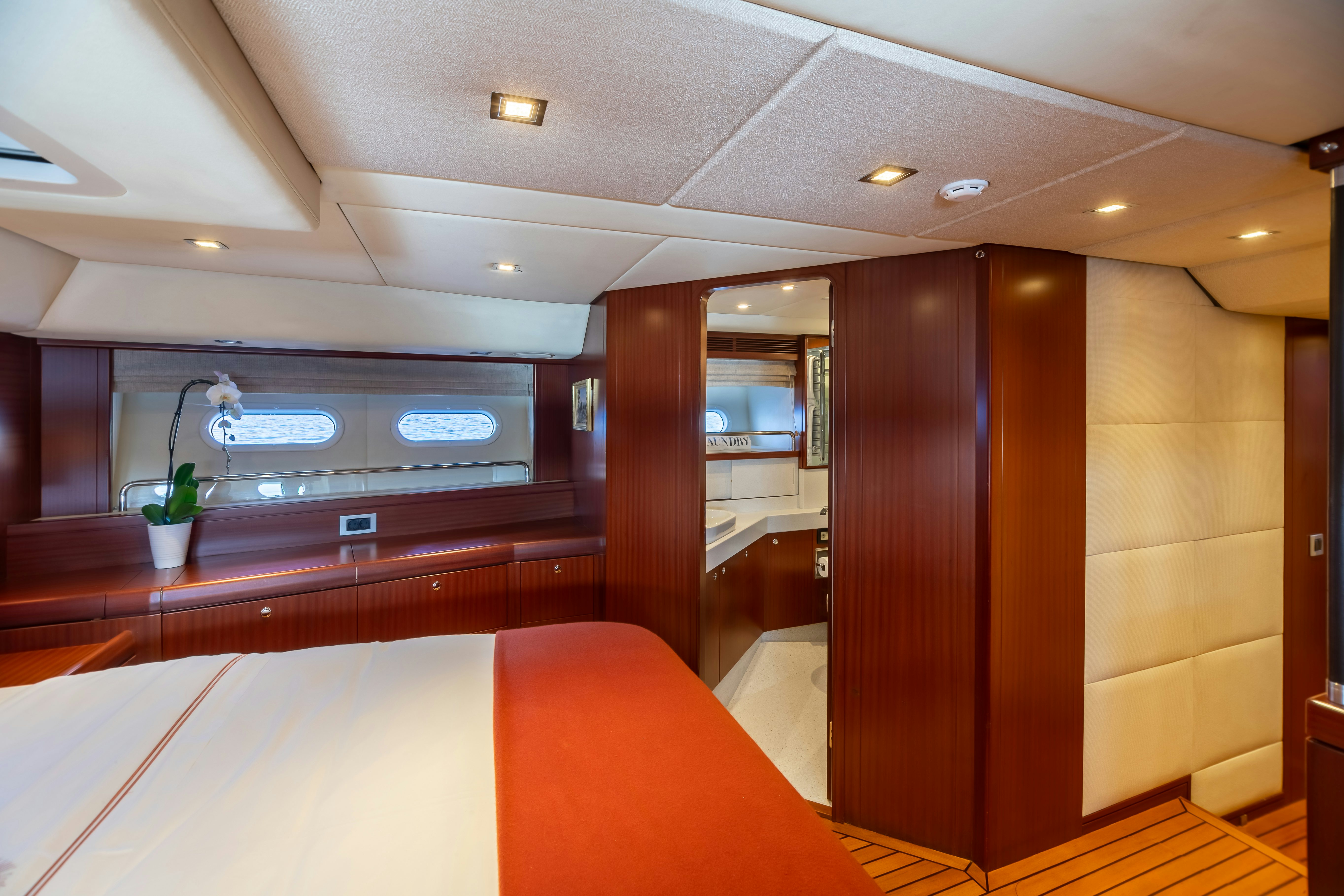 a room with a large mirror aboard ASSAI Yacht for Sale