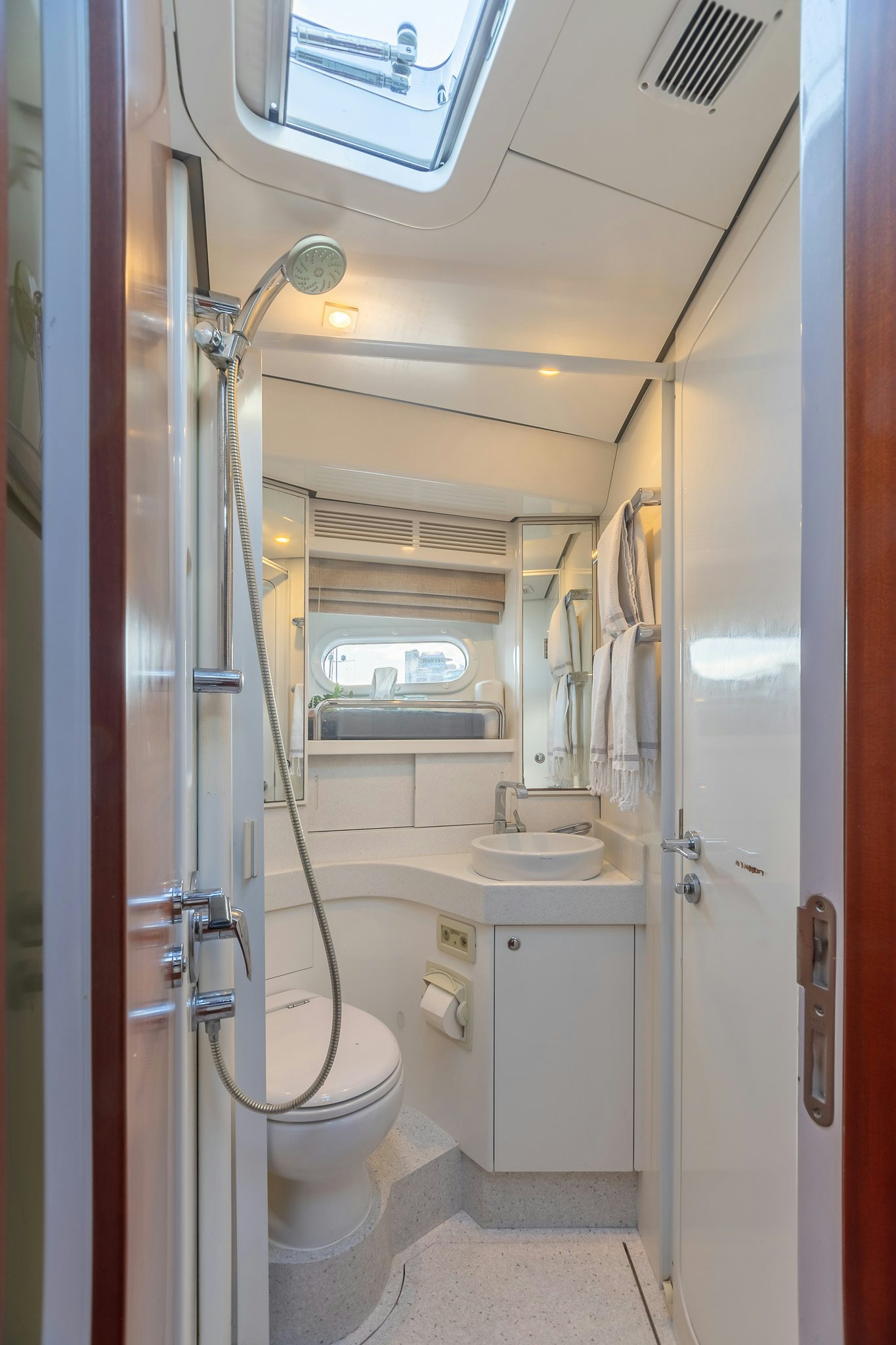 a bathroom with a sink and toilet aboard ASSAI Yacht for Sale