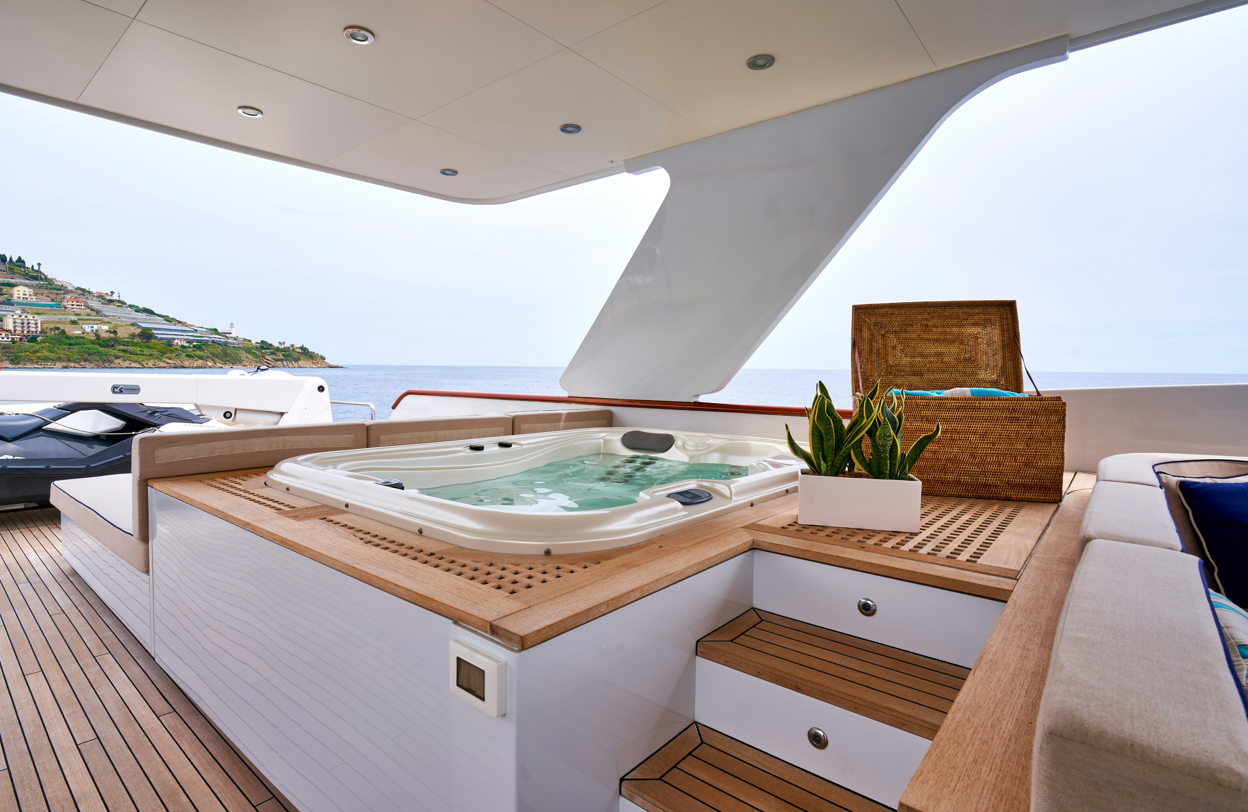 a room with a large window overlooking a body of water aboard L'INSTANT IV Yacht for Sale