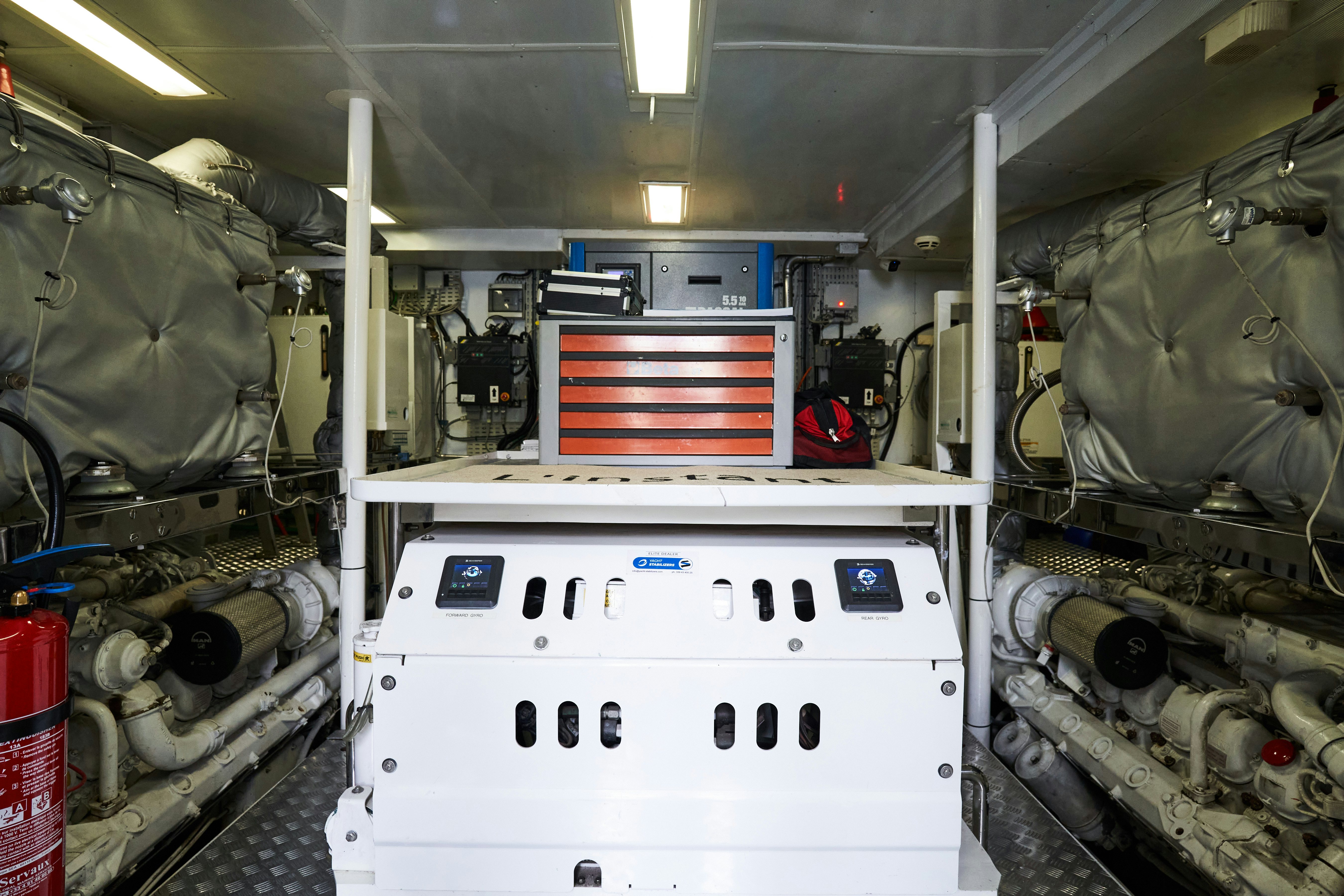 a machine in a room aboard L'INSTANT IV Yacht for Sale
