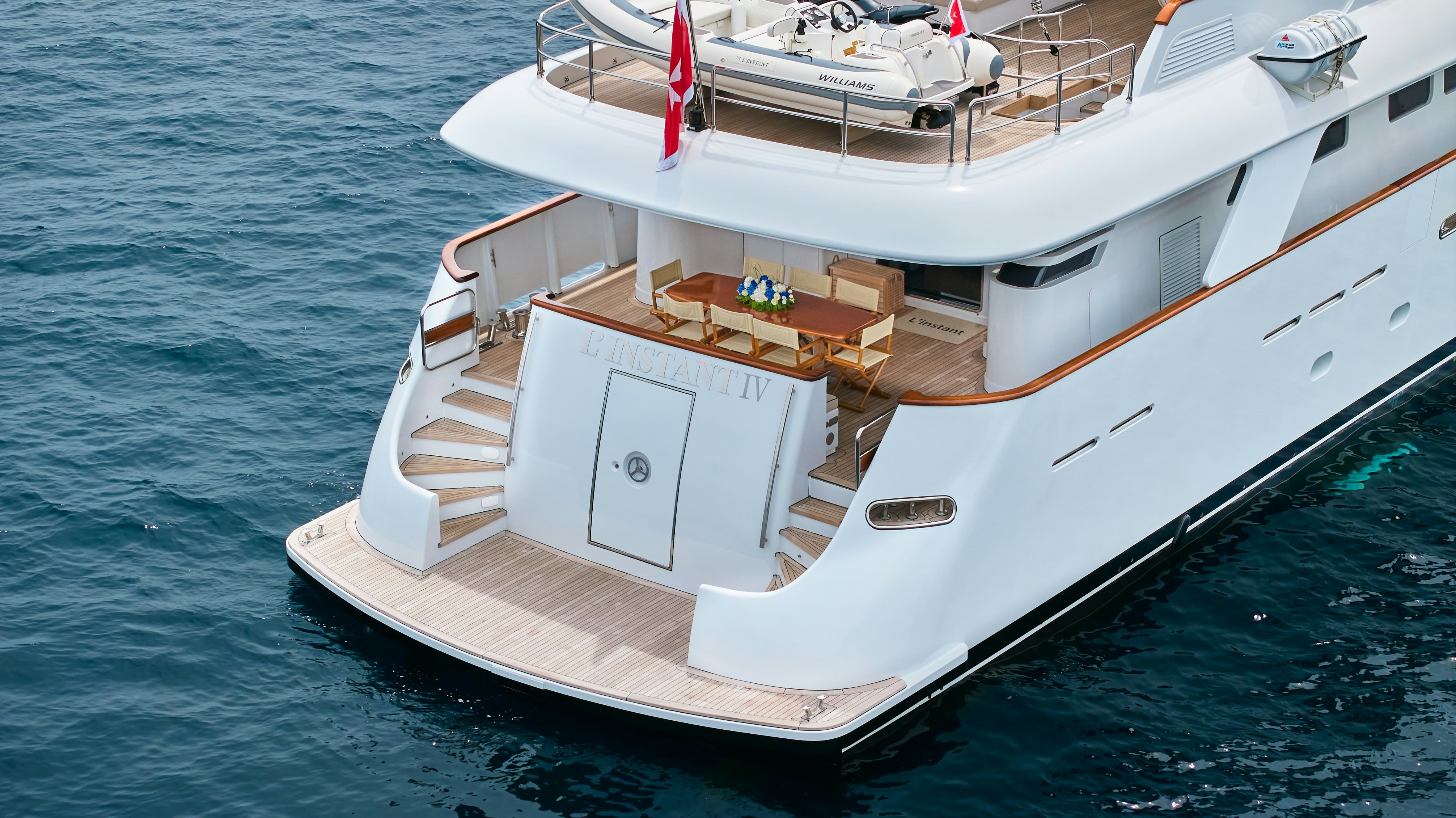 a boat on the water aboard L'INSTANT IV Yacht for Sale