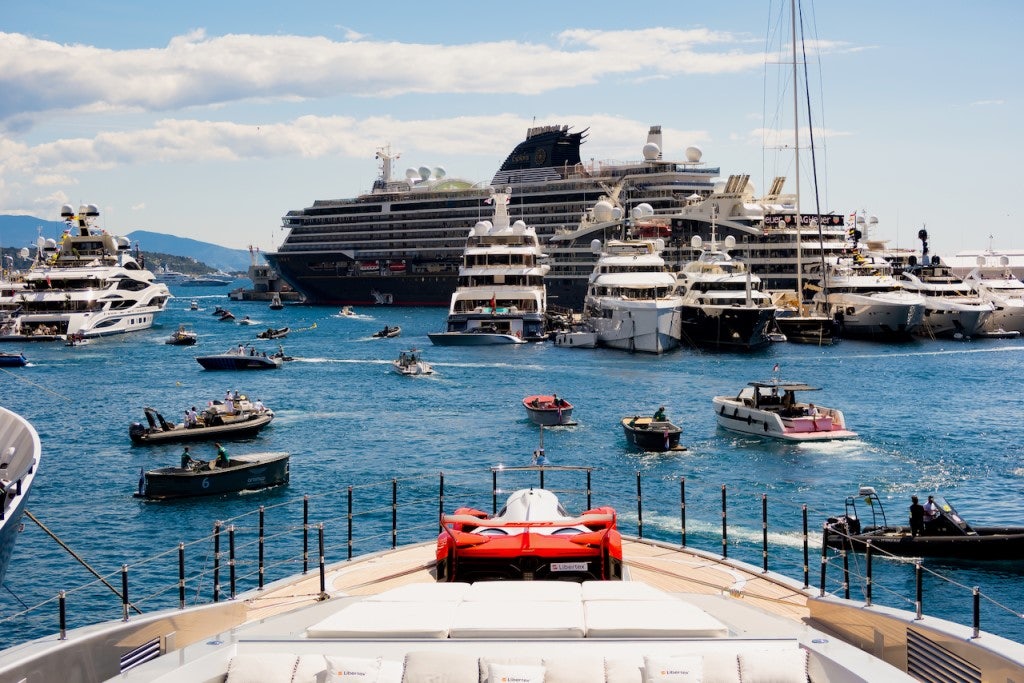 a group of boats in a harbor aboard SARASTAR Yacht for Charter