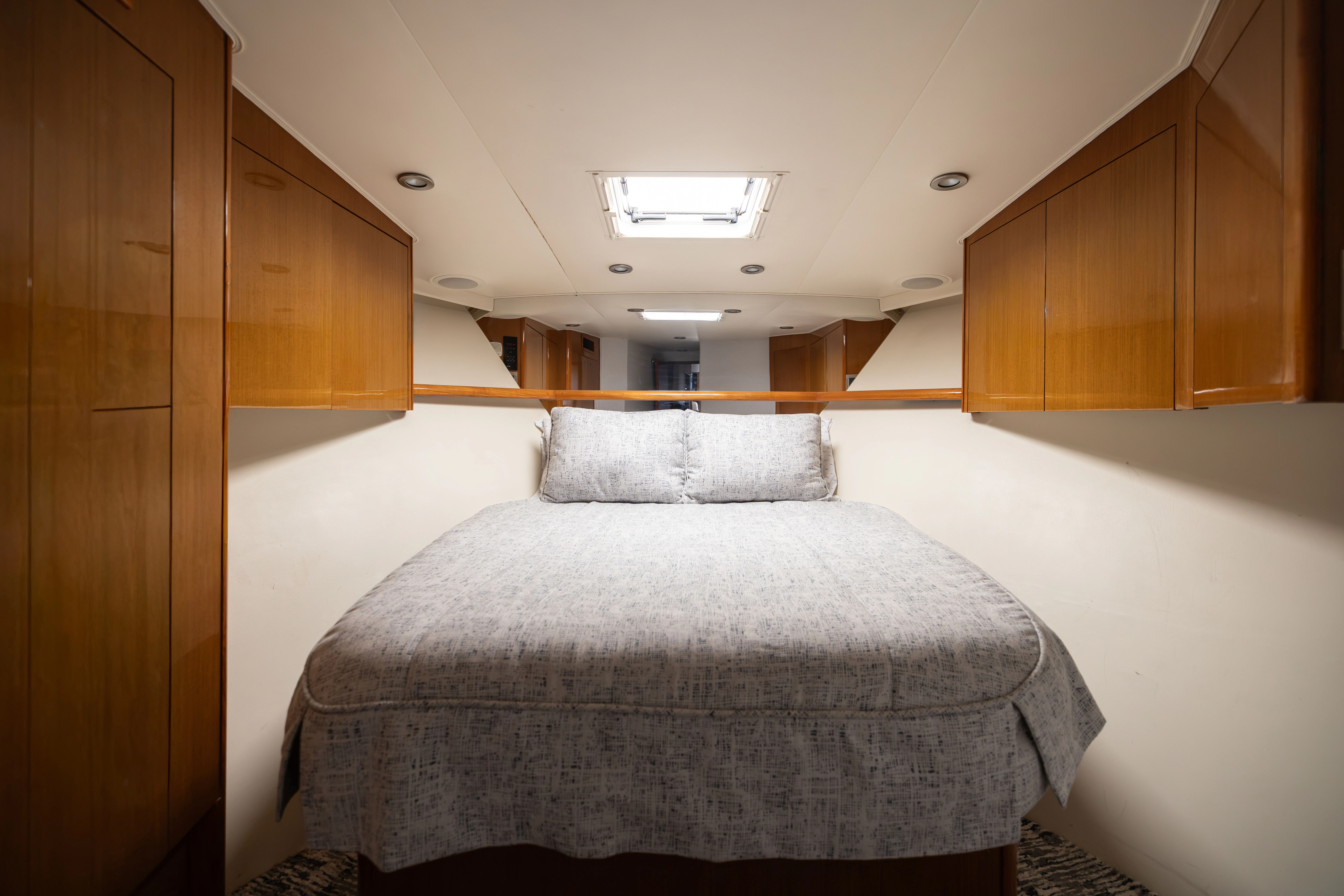 a bed in a room aboard ANEJO Yacht for Sale