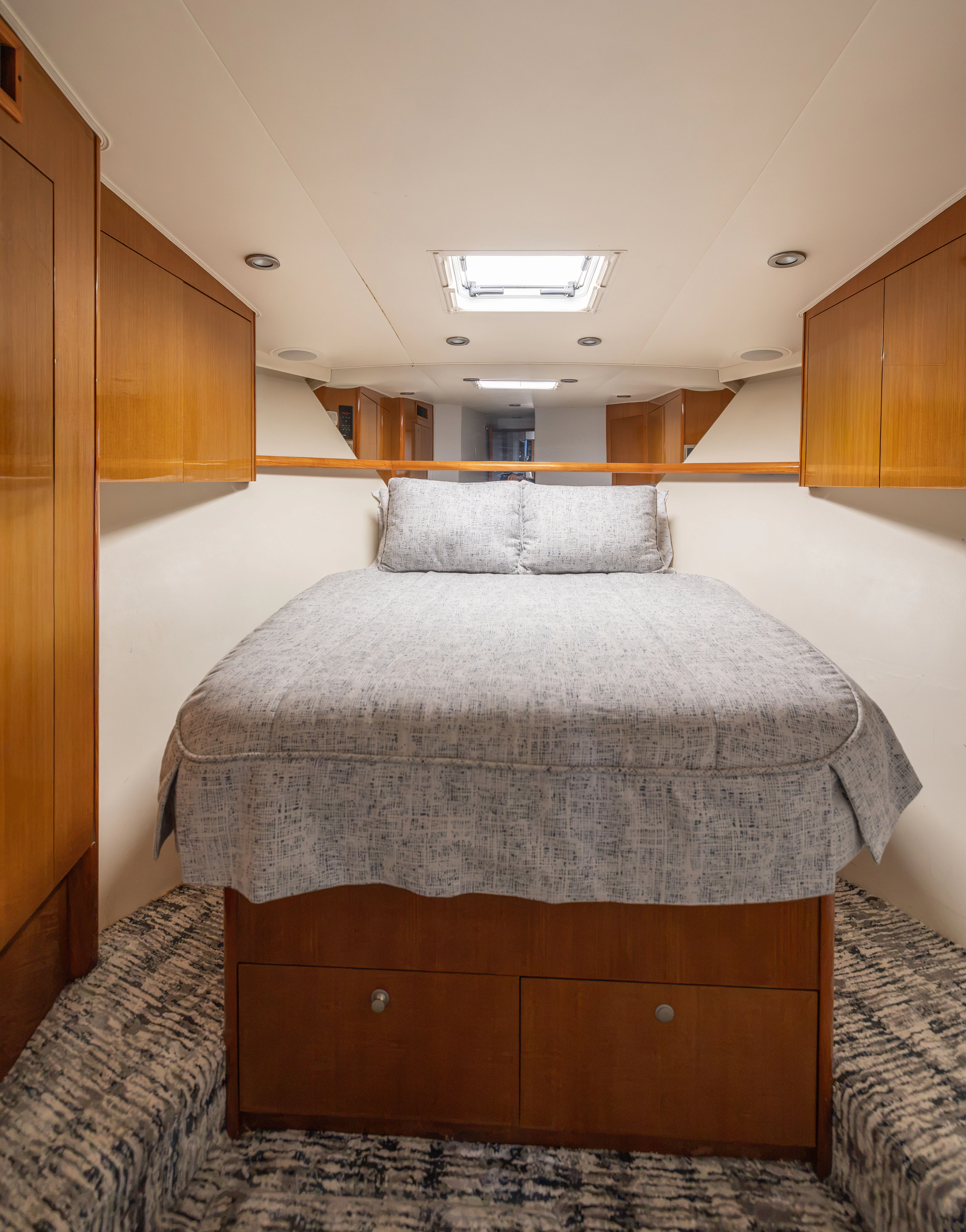 a bed in a room aboard ANEJO Yacht for Sale