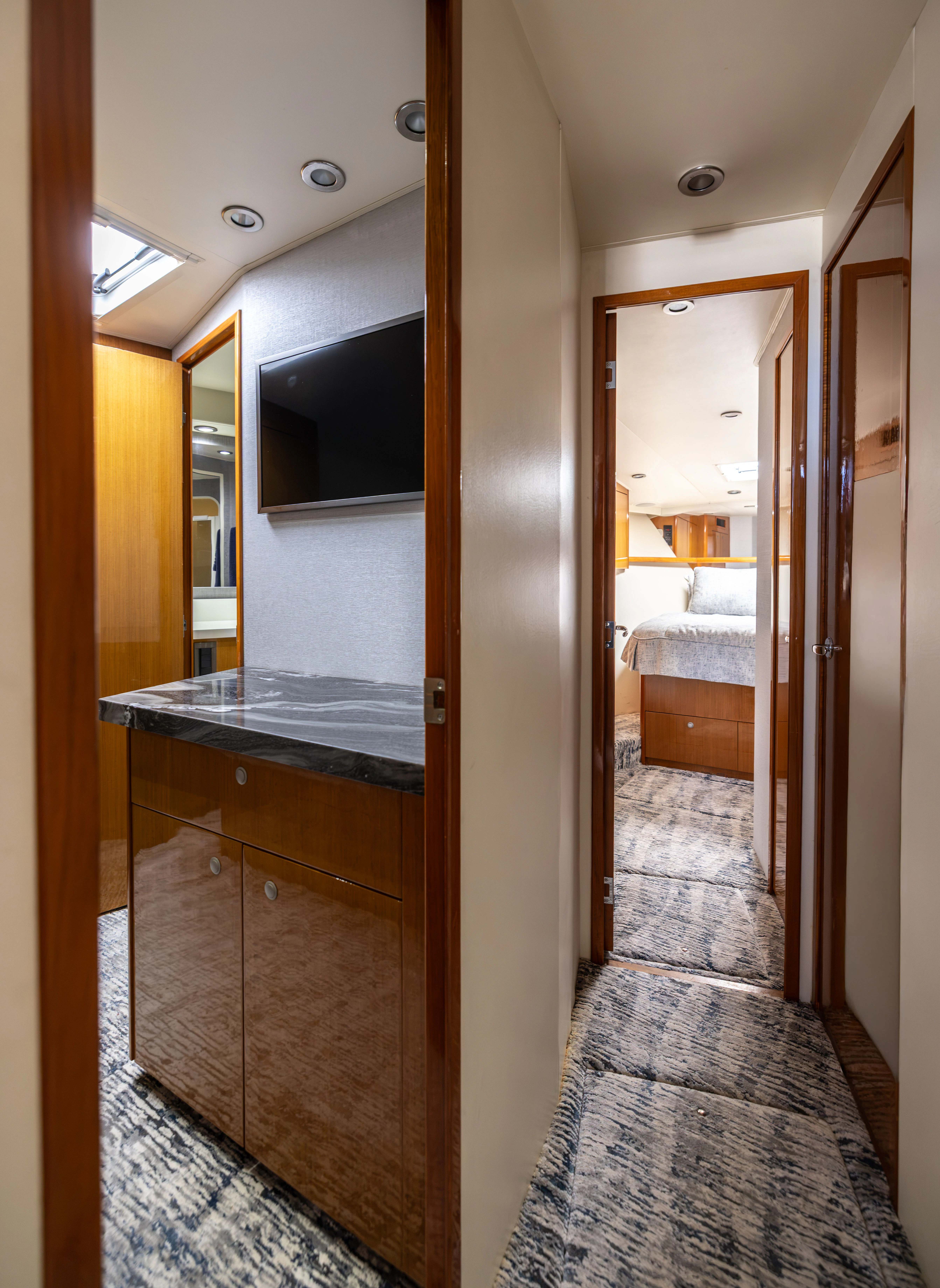 a hallway with a glass door aboard ANEJO Yacht for Sale