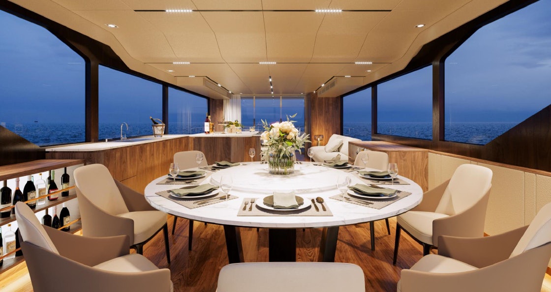 a large room with a table and chairs aboard ALLEGRO FLYBRIDGE 82 MODEL-X Yacht for Sale