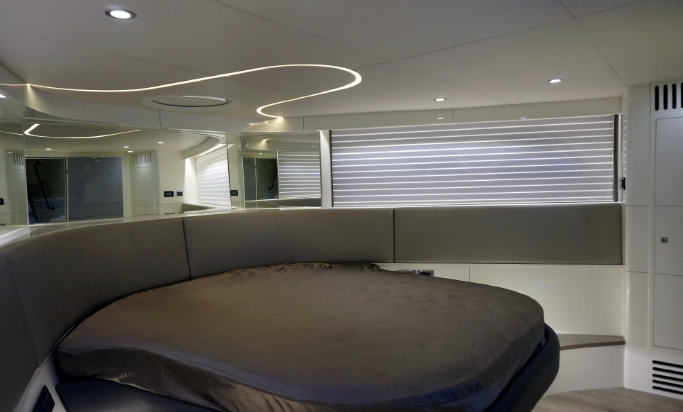 a bed in a room aboard ALLEGRO FLYBRIDGE 82 MODEL-X Yacht for Sale