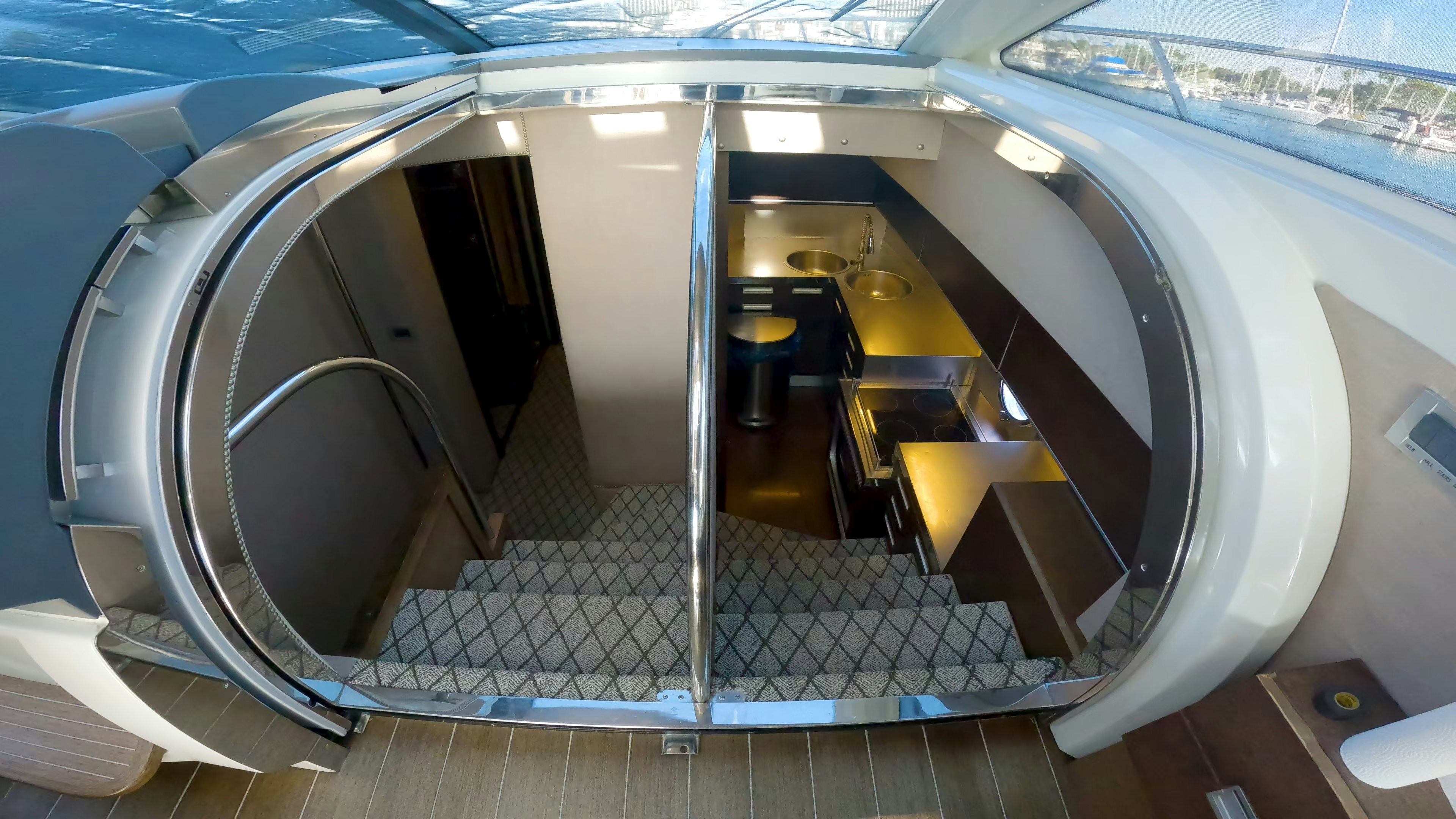 a large room with a staircase aboard BOAT Yacht for Sale