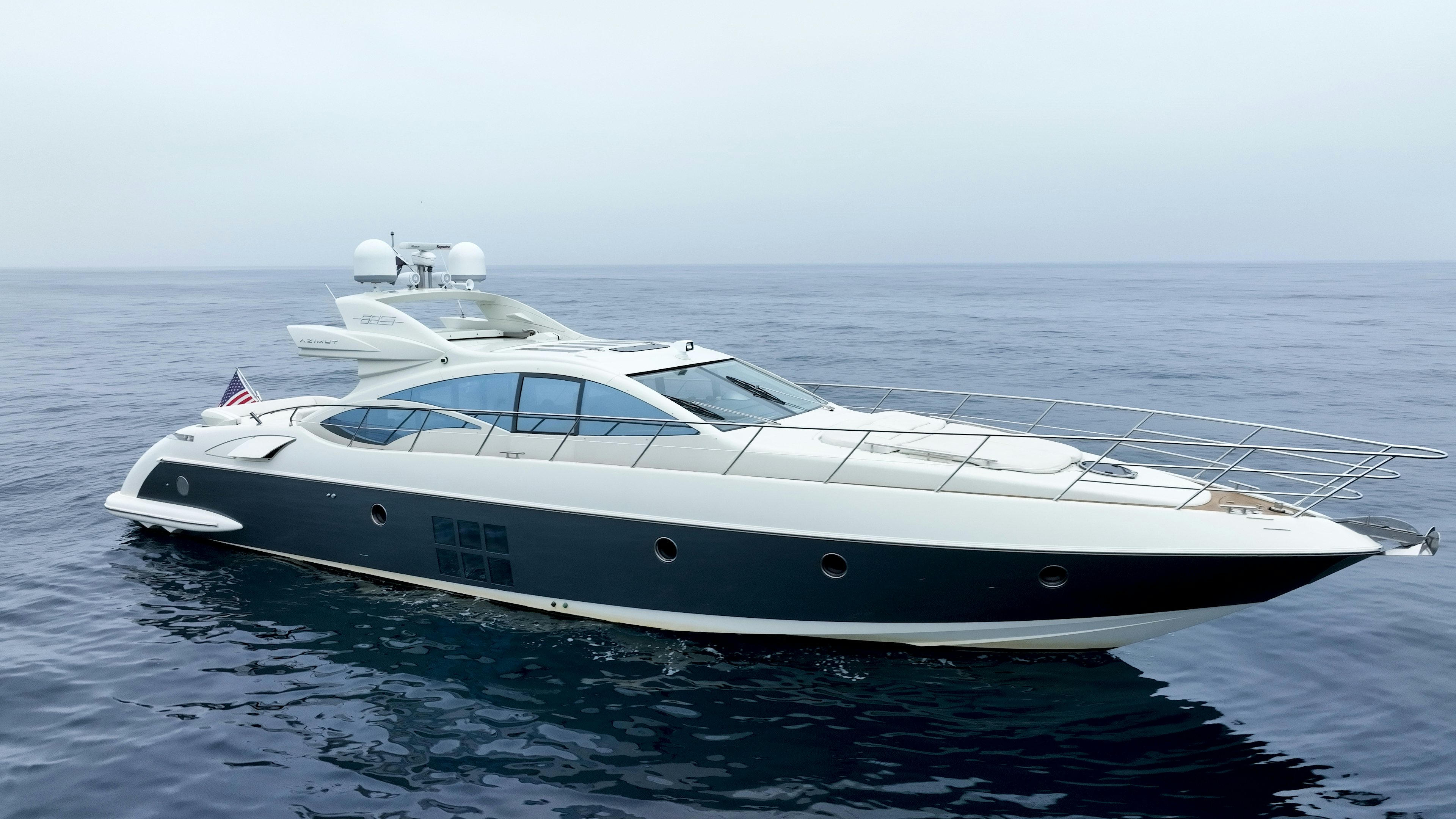 a white yacht in the water aboard BOAT Yacht for Sale