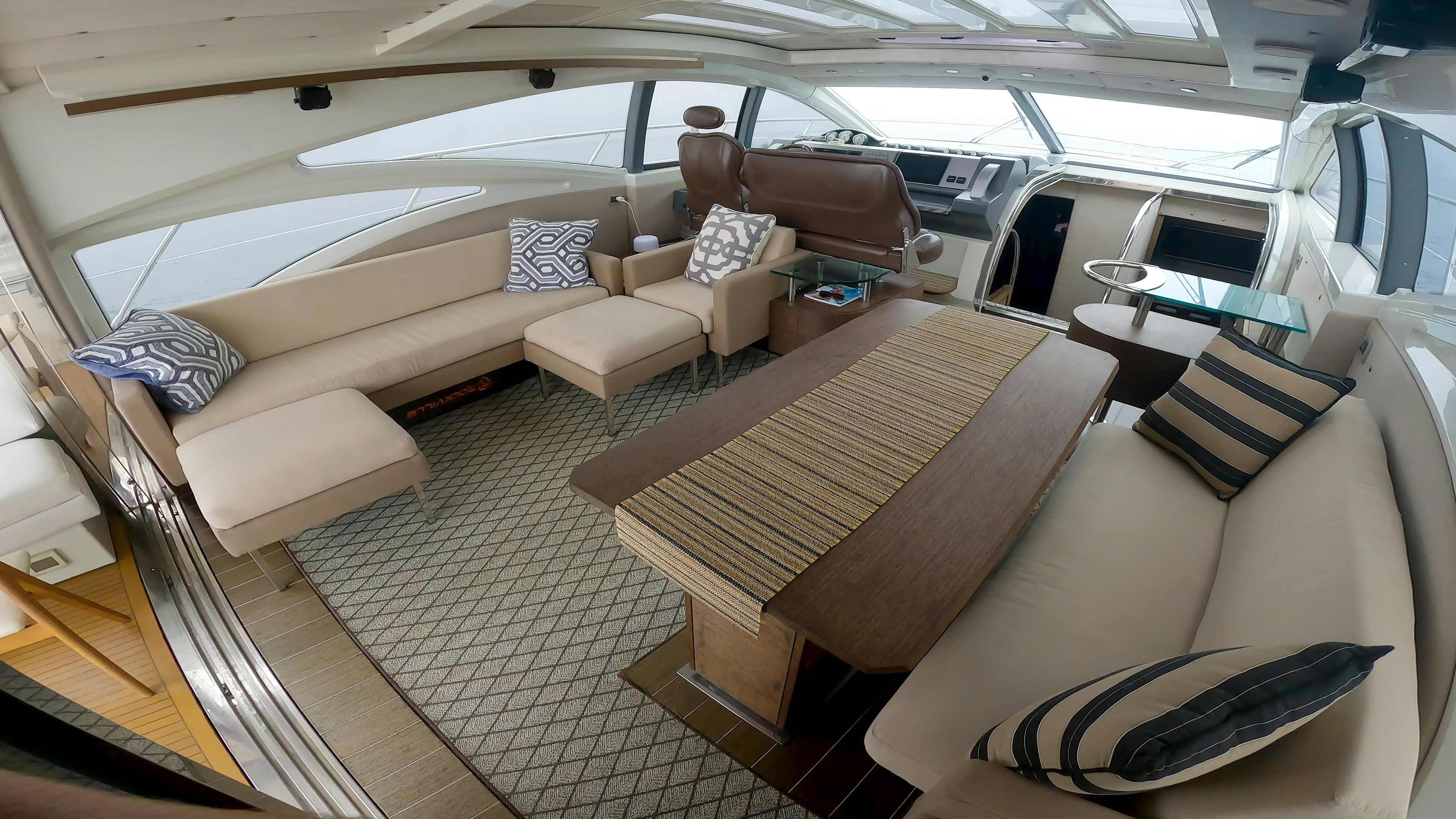 a room with a couch and a table aboard BOAT Yacht for Sale